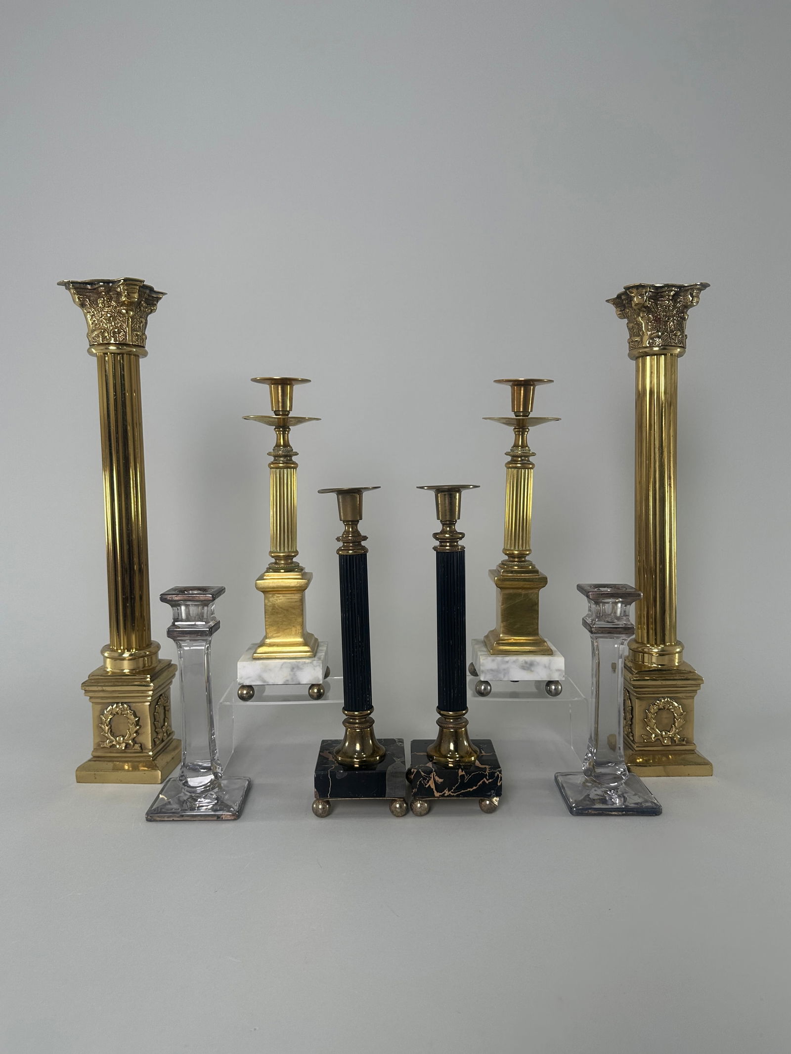 Collection of 8 Assorted Candlesticks: A collection of 8 candlesticks. Tallest item measures 17.75 inches. Total weight is 280 oz.