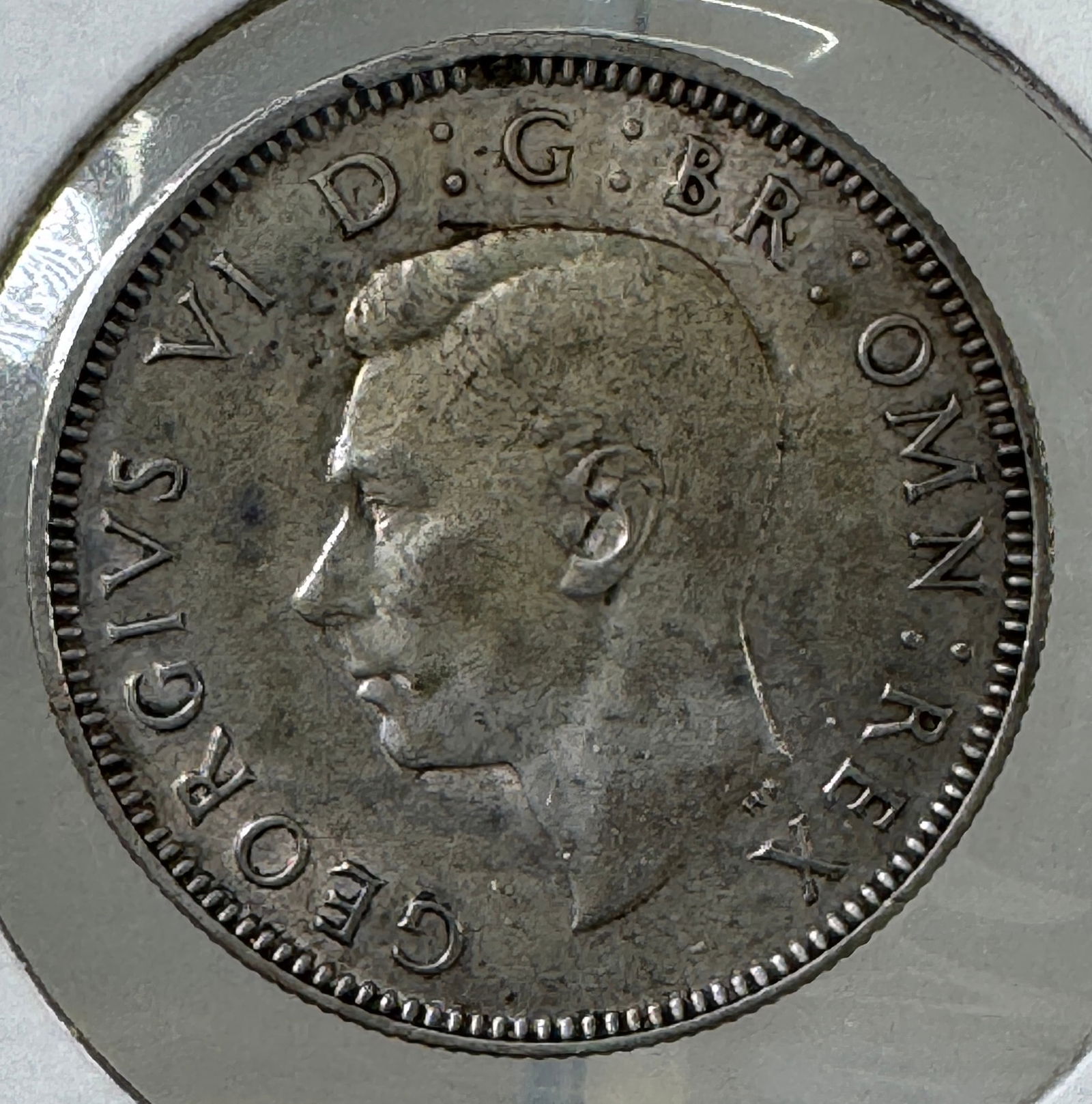 -*1942 Great Britain One Shilling .500 Silver Coin - George VI (1 of 2)