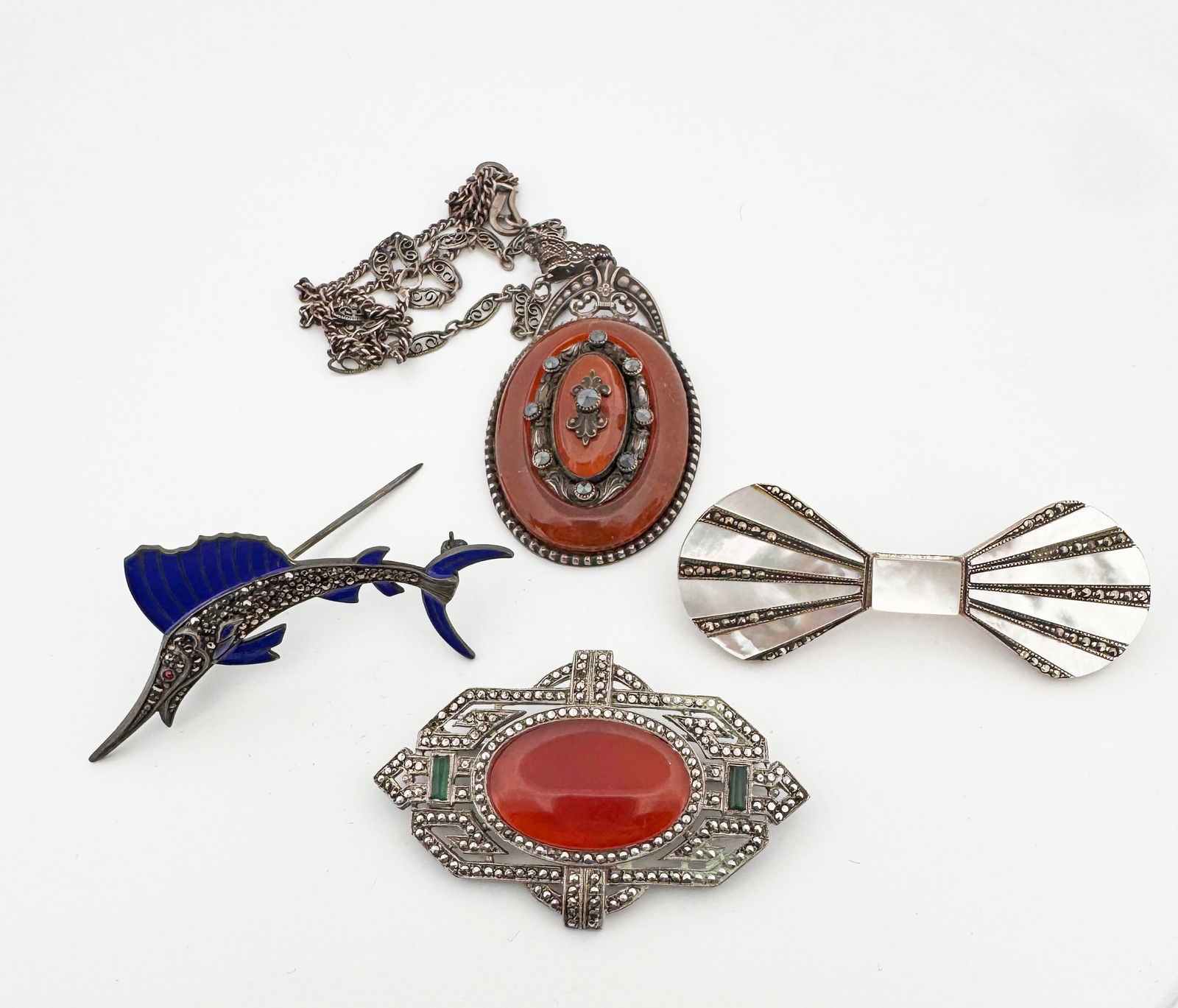 Sterling Marcasite Group: 58.7g2.25" largest18" chain