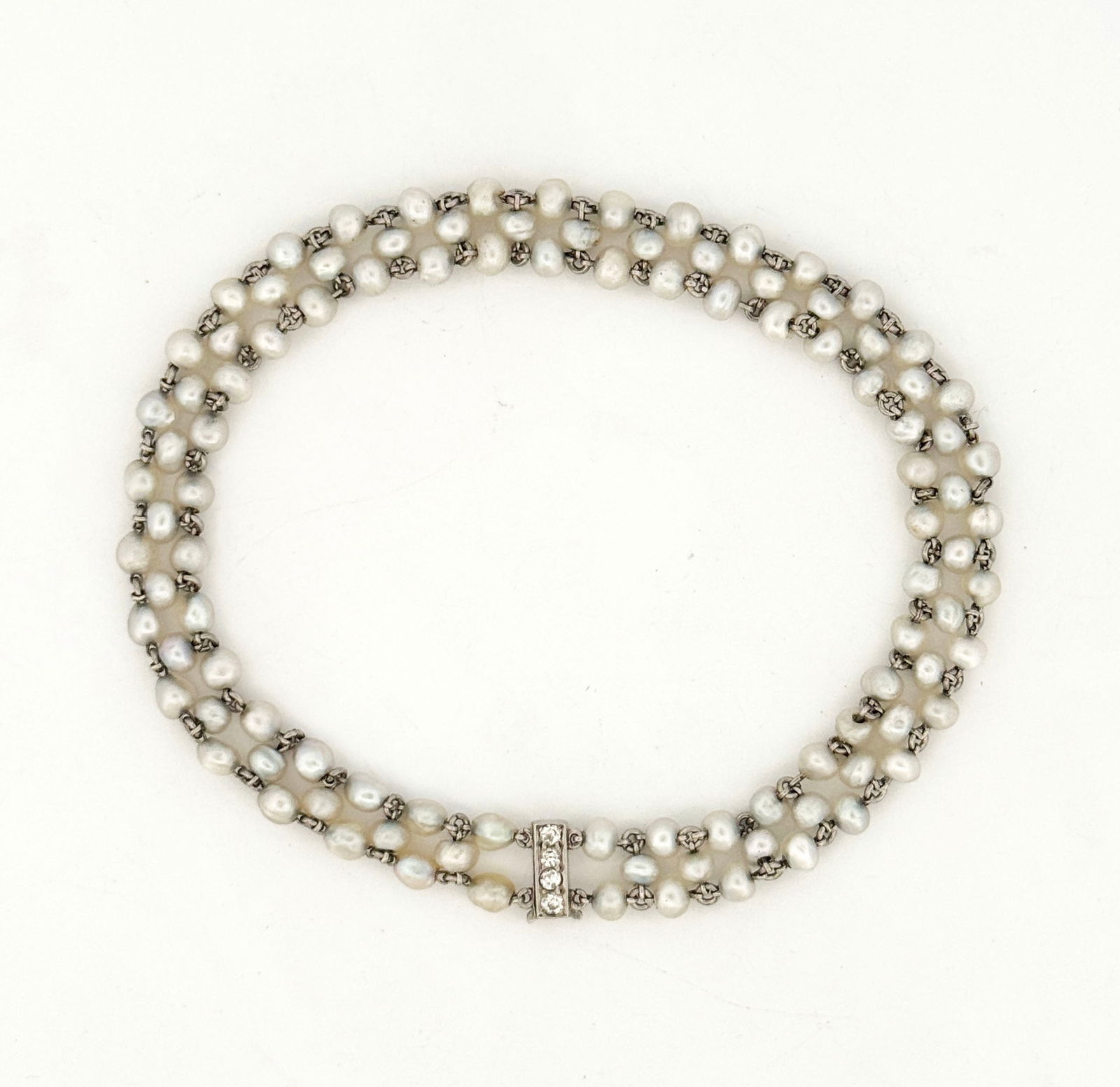 Antique Pearl & Diamond Bracelet: 18k and diamond clasp7.6g7.5" long