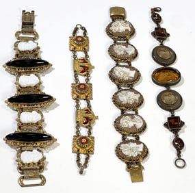 Group of Four Bracelets with Faces and Crowns