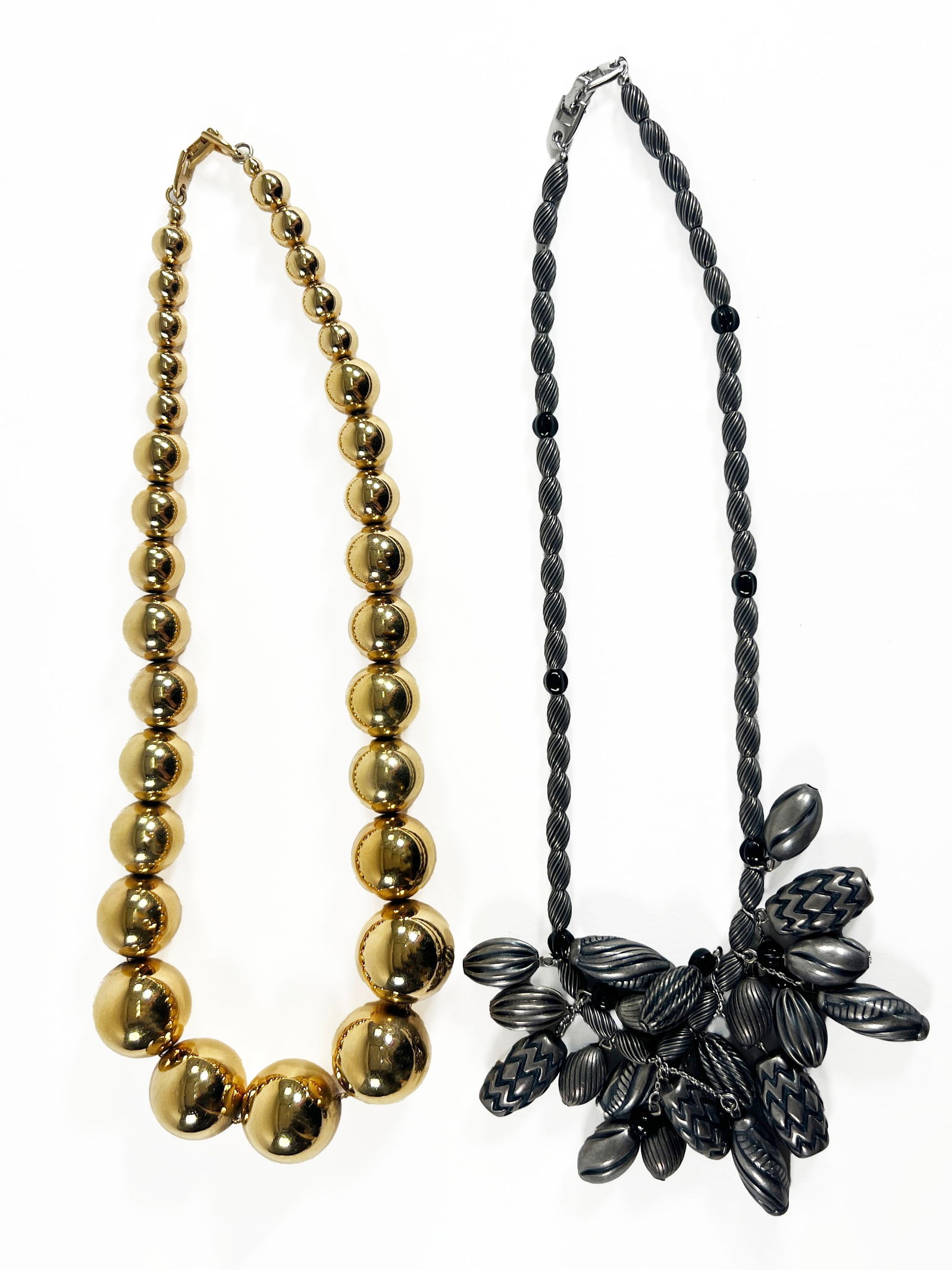 Two Napier Necklaces: Two Napier costume necklaces, both signed on the clasps. Longest necklace measures 10.25 inches. Total weight: 204.1g