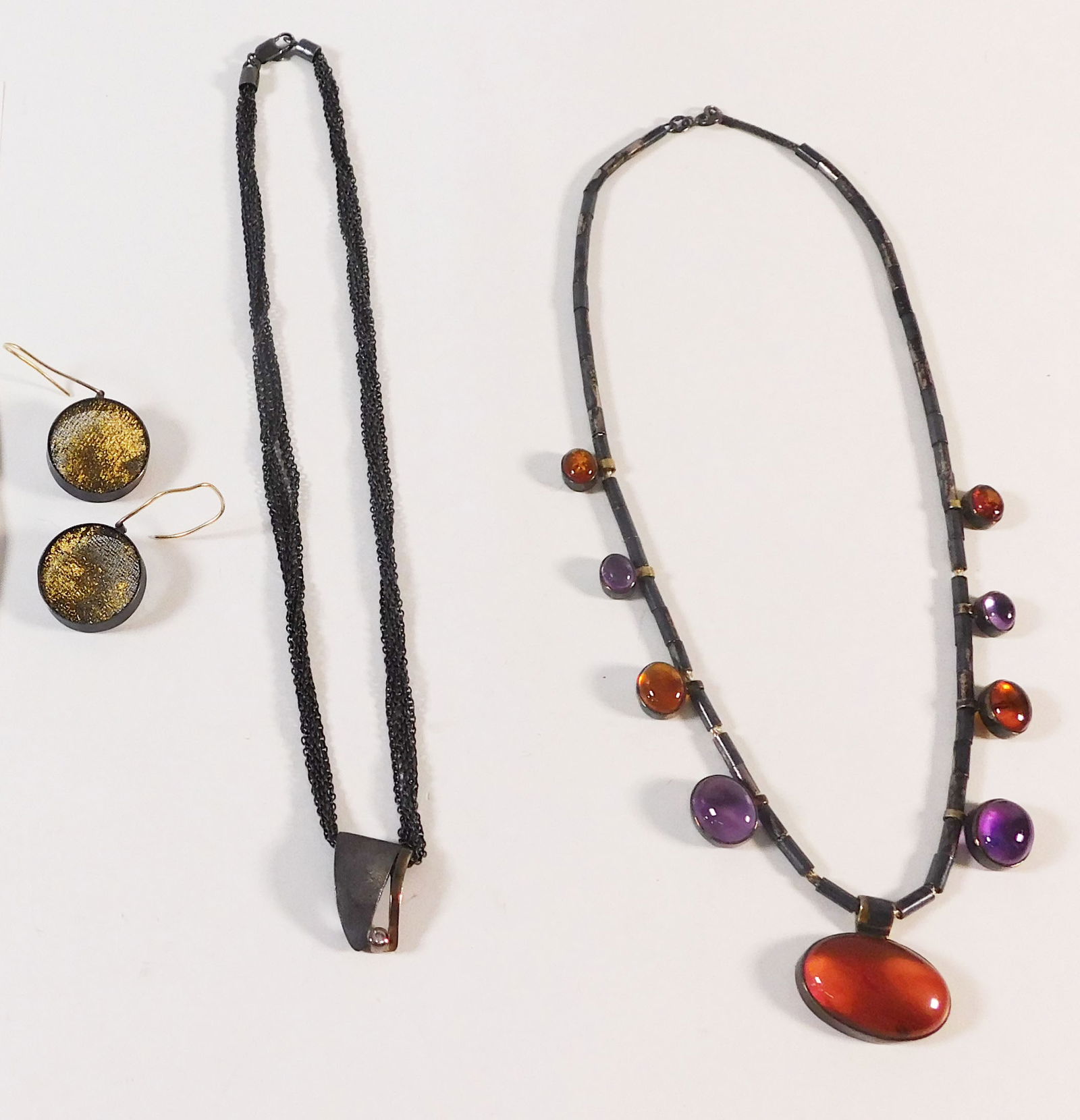 Niki Ulehla Lulo Jewelry: A set of jewelry by Niki Ulehla for Lulo, featuring two necklaces and a pair of earrings. The largest necklace measures 16.5 inches. Total weight is 65.2g