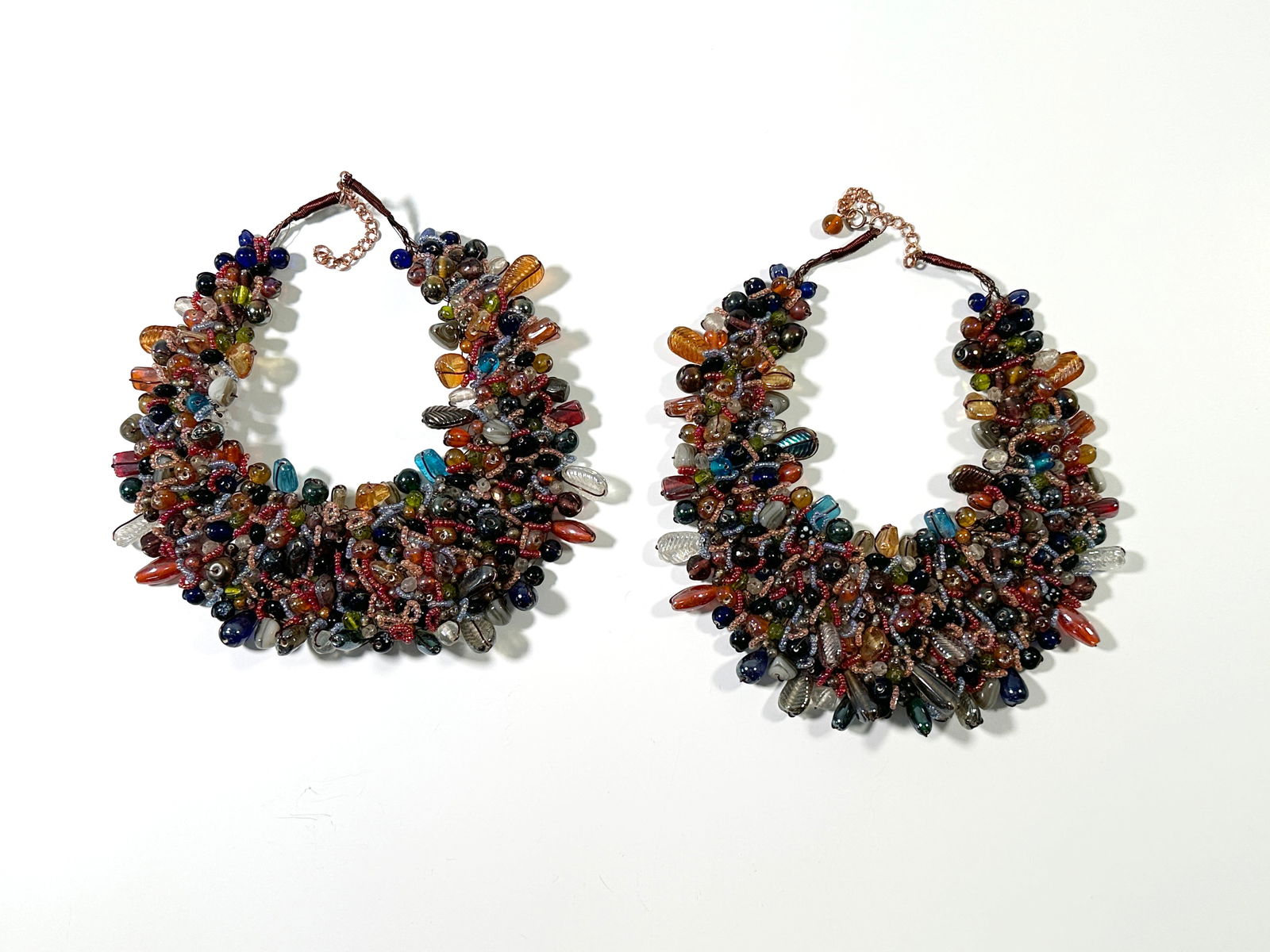 Two Multi-Color Beaded Bib Necklaces: Two beaded bib necklaces made with glass beads and copper wire and closures.Larger necklace 17" total weight: 626.5g