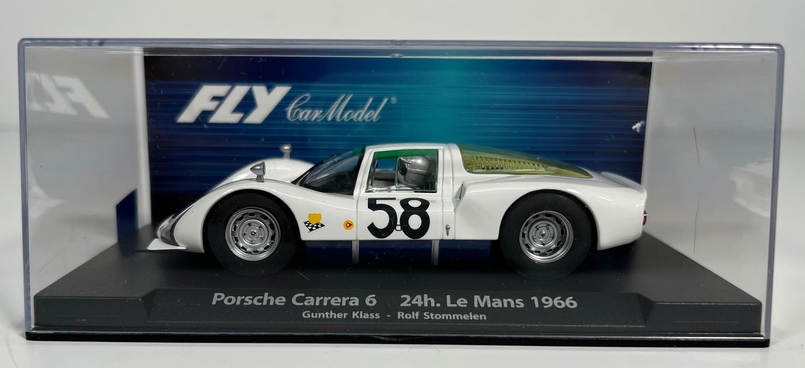 Fly Car Model Porsche Carrera 6 24h. Le Mans 1966 #58: Fly Car Model Porsche Carrera 6 24h. Le Mans 1966 Klass-Stommelen #58 1/32 S-XR48 Slot Car. Reference #88345, with original case. Dimensions: 2.5'' x 6.5''. Weight: 6oz.