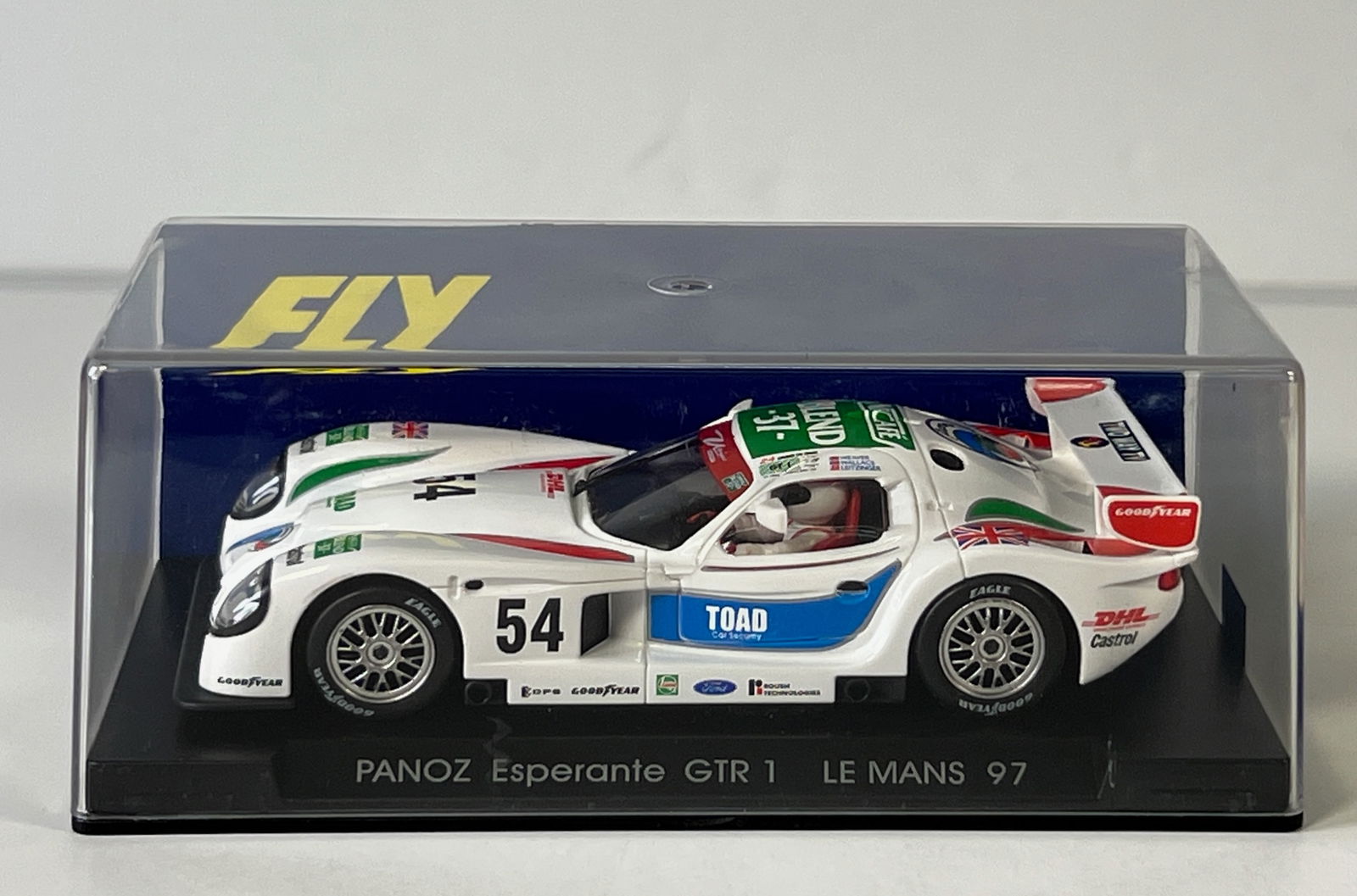 Fly Panoz Esperante GTR 1 Le Mans 97 #54: Fly Panoz Esperante GTR 1 Blanco 54 Le Mans 97 #54 Nescafe 1/32 Slot Car. Reference #A61, with original case. Weight: 6 oz. 