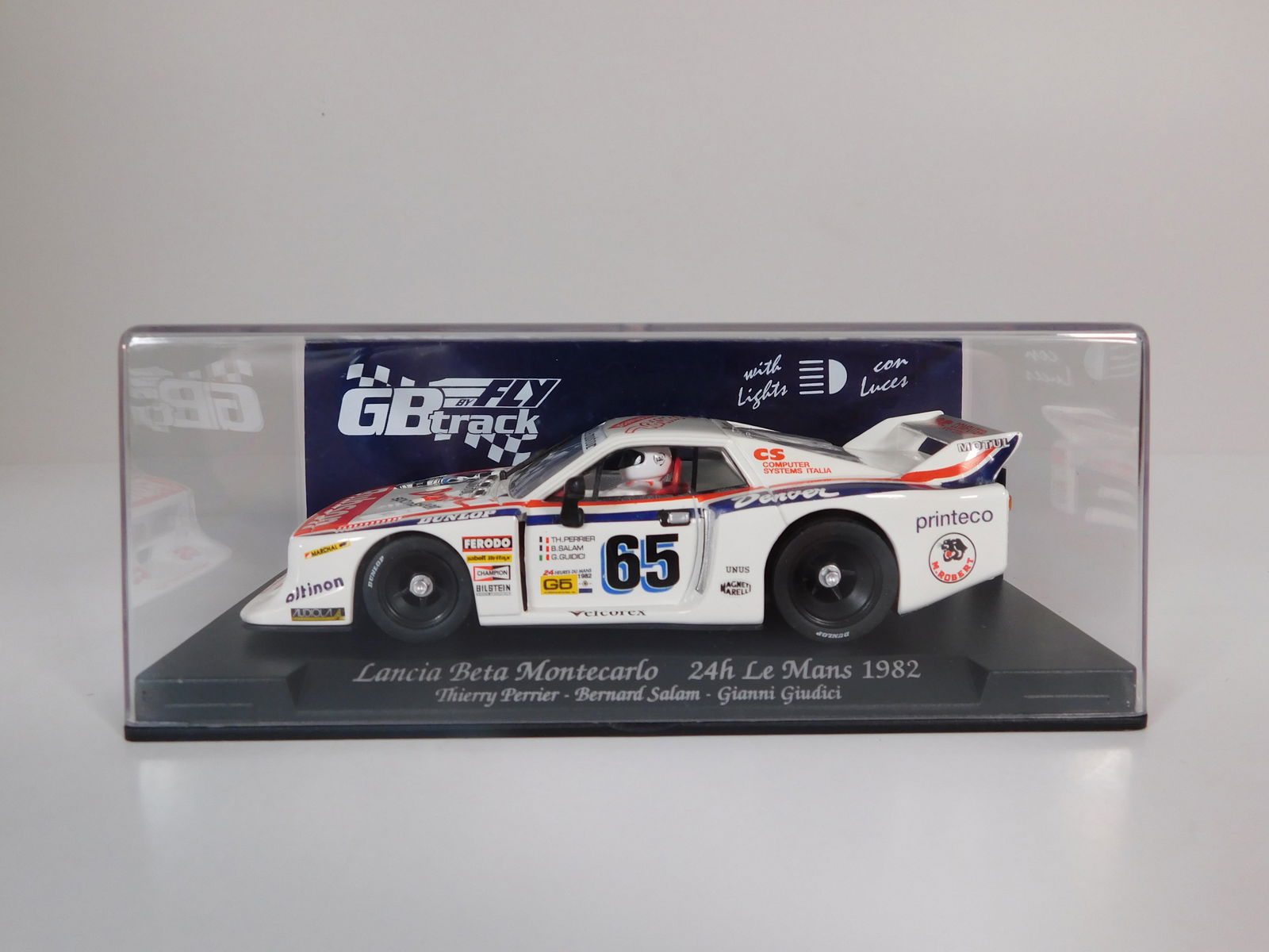 GB Track Lancia Beta Montecarlo 24h Le Mans 1982 #65: GB Track Lancia Beta Montecarlo 24h Le Mans 1982 GB 39 L Perrier-Giudici #65 Rubson 1/32 Slot Car. Reference #07501, with original case . Weight: 7oz.