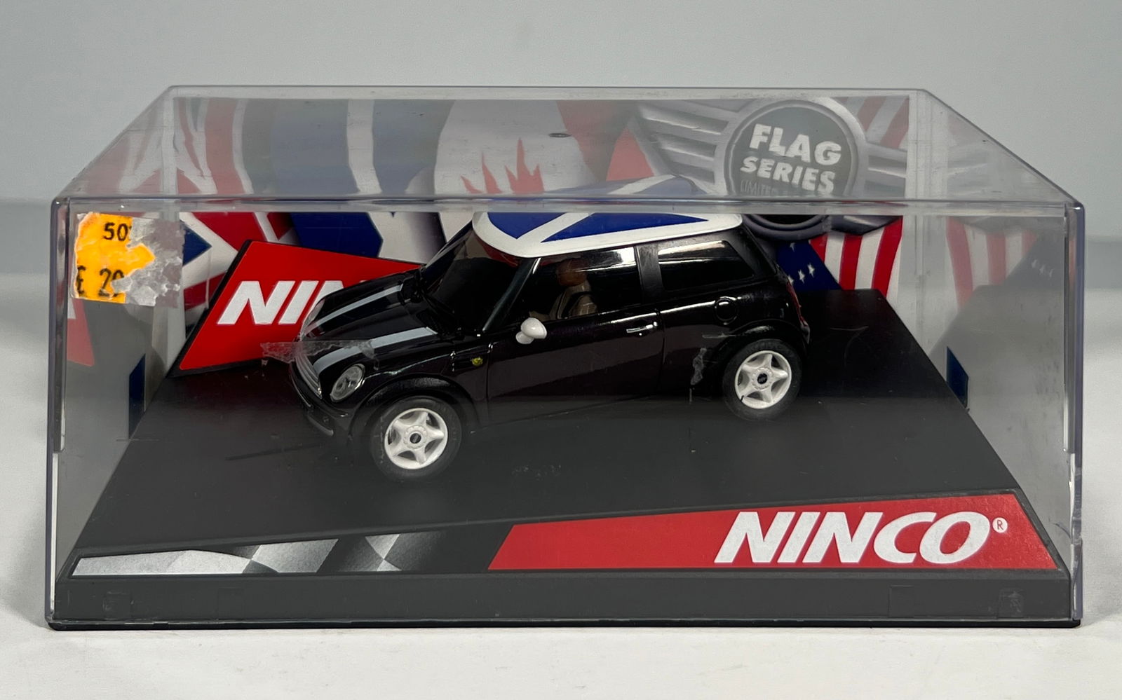 Ninco Mini Cooper 'Scotland' Flag Series: Ninco Mini Cooper 'Scotland' Flag Series 1/32 Slot Car. Reference #50310, with original case. Weight: 9 oz.