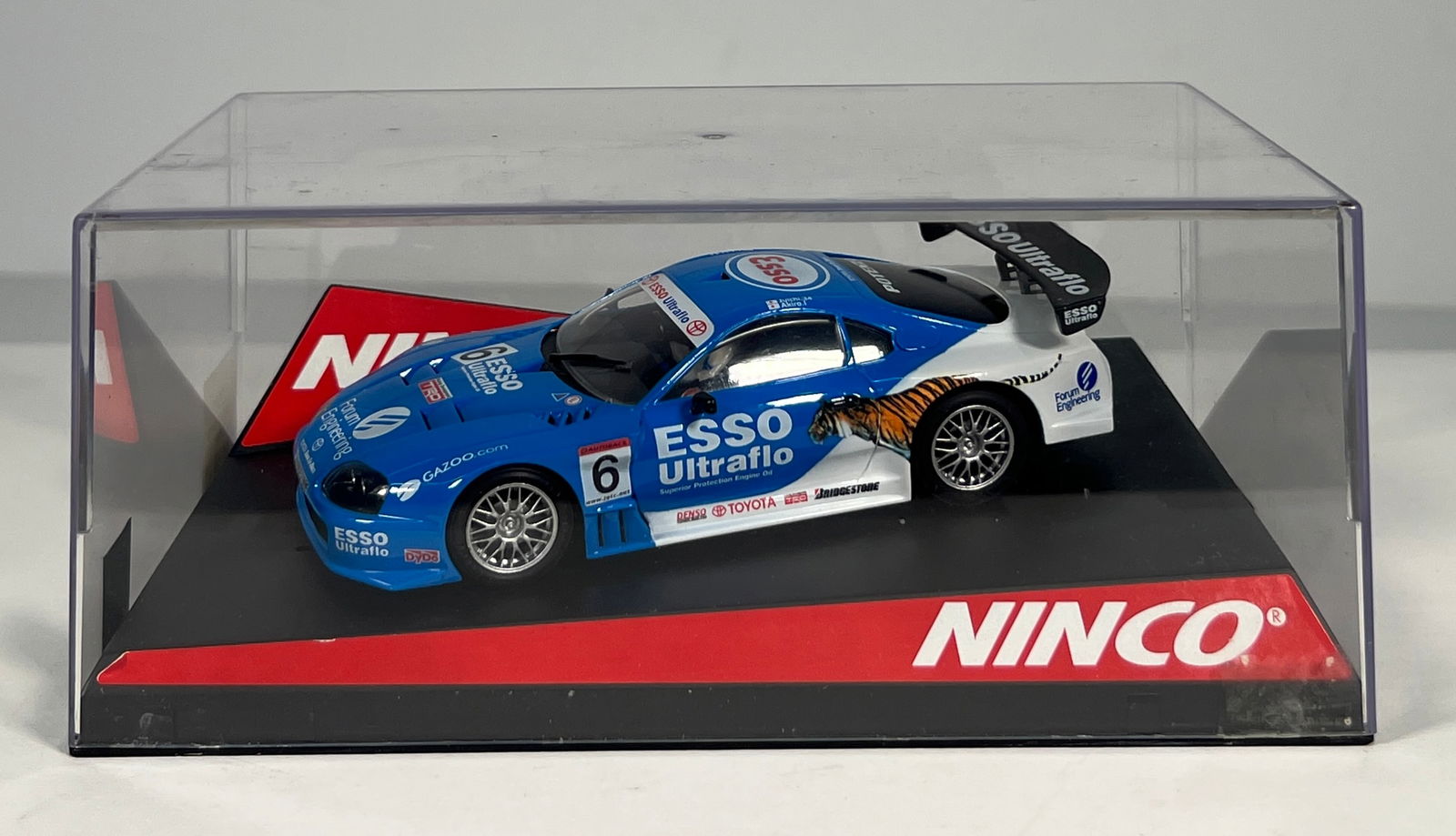 Ninco Toyota Supra Esso Ultraflo #6: Ninco Toyota Supra Esso Ultraflo #6 1/32 Slot Car. Reference #50369, with original case. Weight: 9 oz.