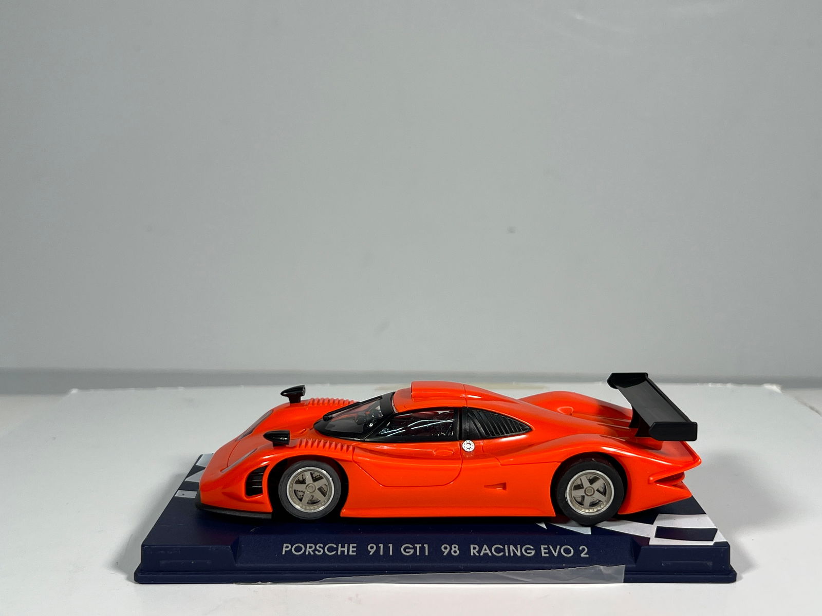 Racing EVO 2 Porsche 911 GT1 '98: Porsche 911 GT1 '98 Racing EVO 2 1/32 Slot Car, with original case. Case measures 2.75 x 6.5 inches. Weight: 6 oz.