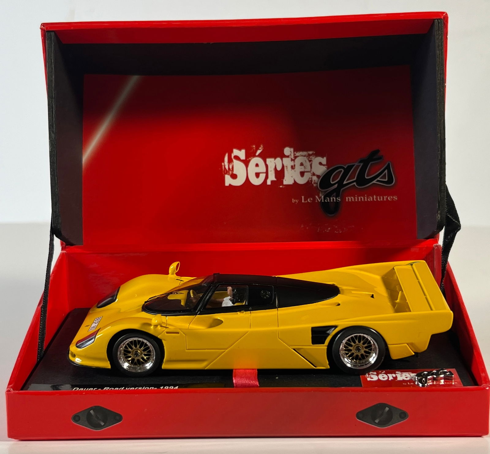 Le Mans Miniatures Series GTS Dauer 962 Road Version - 1994: Le Mans Miniatures Series GTS Dauer 962 Road Version Yellow 1994 1/32 Slot Car Reference #132048M, with original case. Case measures 3.5 x 7.25 inches. Weight 13 oz.