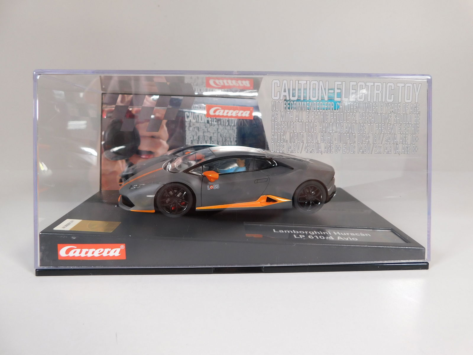 Carrera Evolution Lamborghini Huracan LP 610-4 Avio: Carrera Evolution Lamborghini Huracan LP 610-4 Avio 1/32 Slot Car. Reference #20027551, with original case. Weight: 15.7oz.
