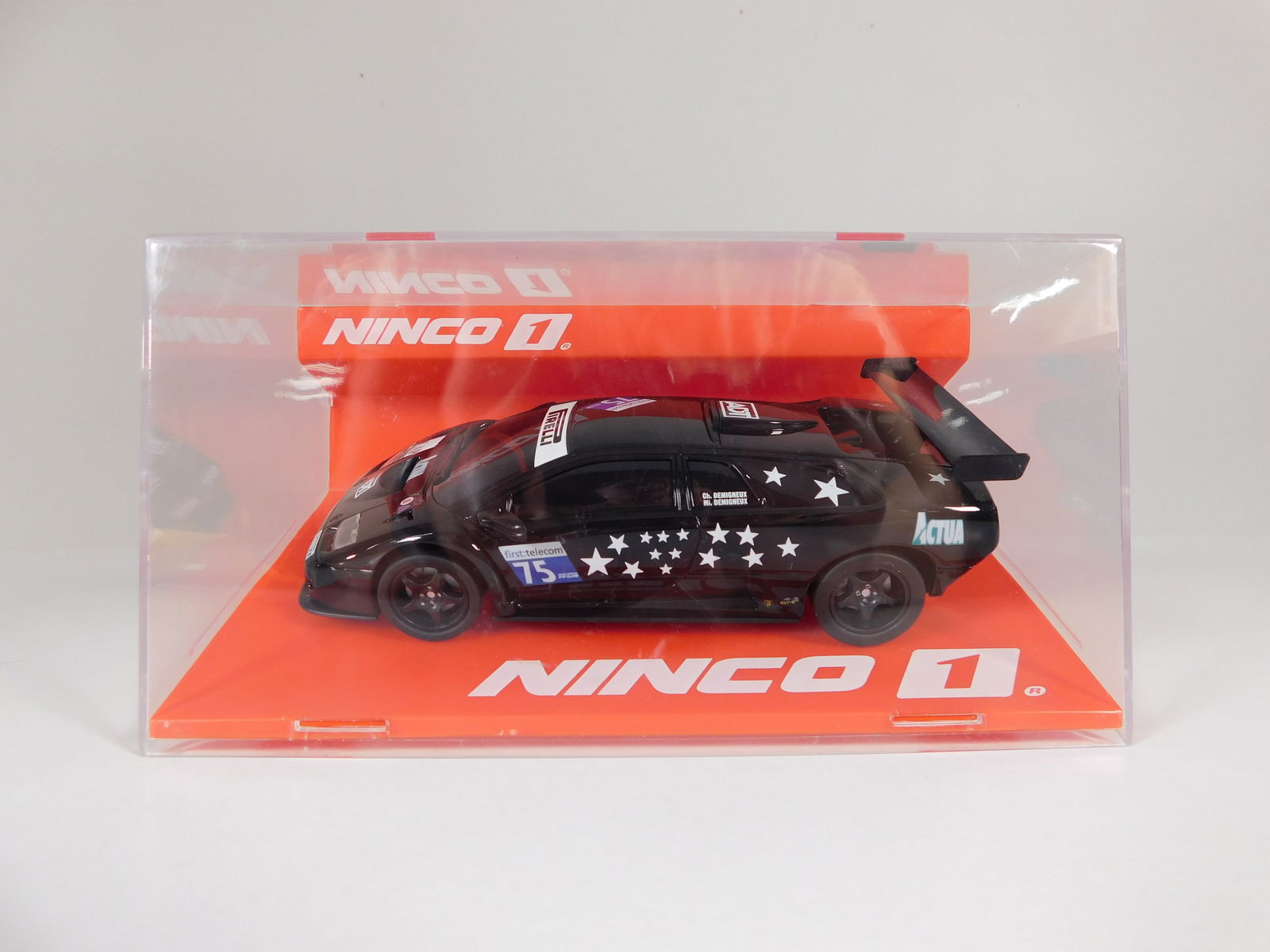 Ninco 1 Lamborghini Diablo GTR #75: Ninco 1 Pirelli #75 ADT 1/32 Slot Car, with original case. Reference #AB2658WJ. Weight: 6.6oz.