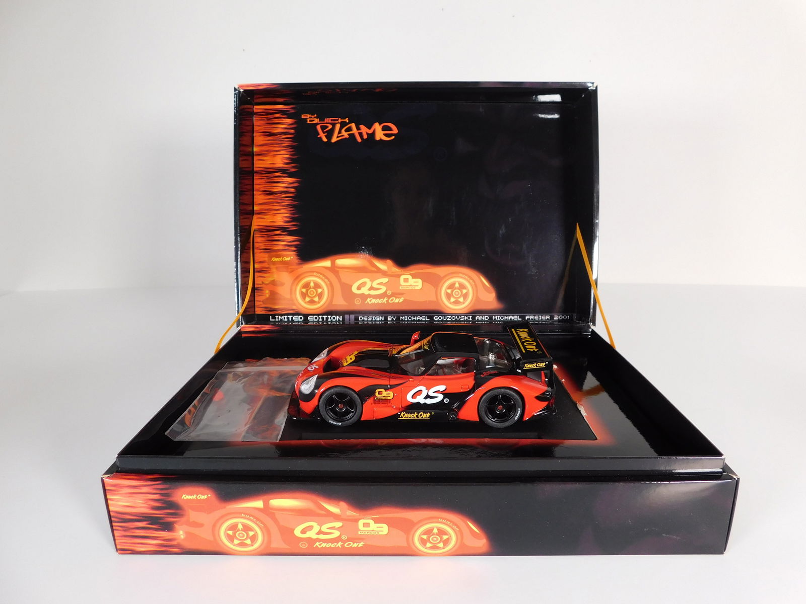 Fly Car Model Racing Marcos 09 by Quick Flame: Fly Car Model Racing Marcos 09 by Quick Flame 1/32 Slot Car, with original case. Weight: 12.6 oz. 