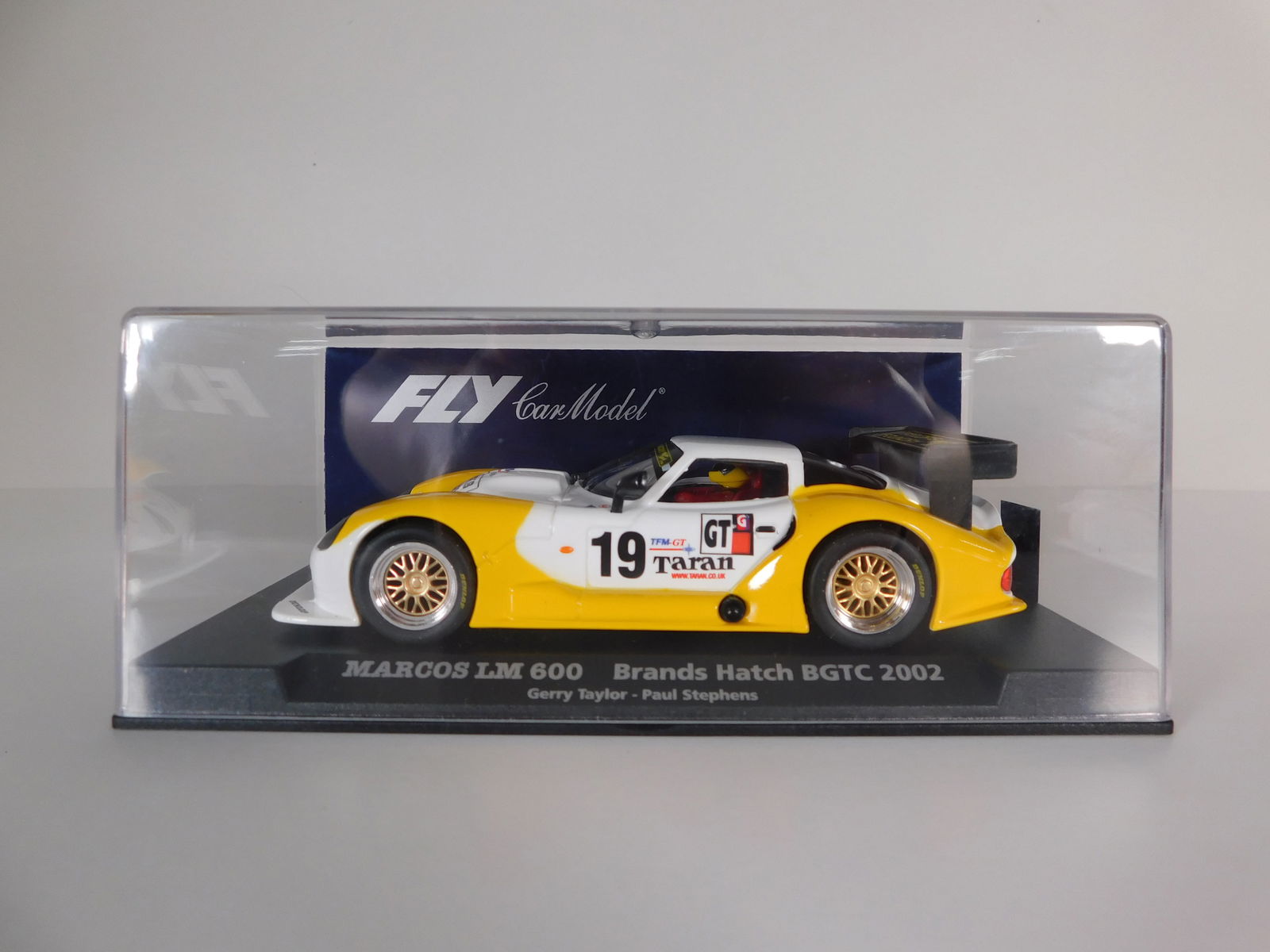 Fly Car Model Marcos LM 600 Brands Hatch BGTC 2002 #19: Fly Car Model Marcos LM 600 Brands Hatch BGTC 2002 Taylor-Stephens #19 Taran 1/32 Slot Car, A-364. Reference #88102, with original case. Weight: 6.5oz.