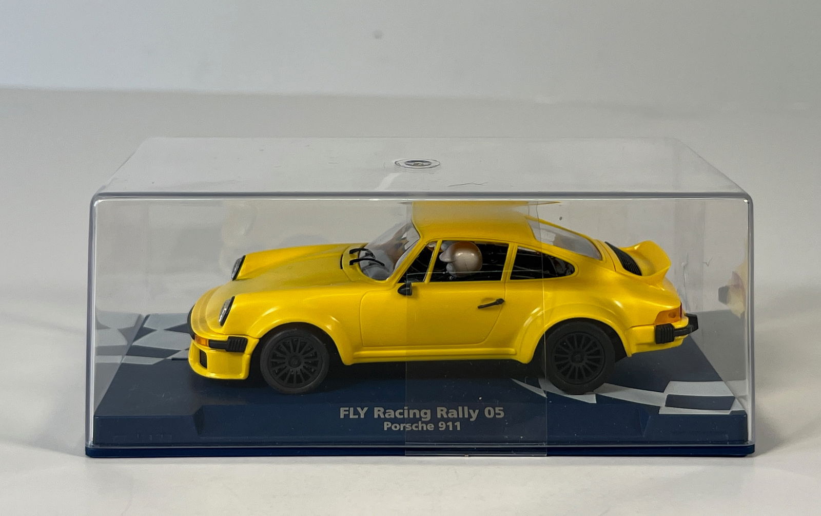 Fly Racing Rally 05 Porsche 911: Fly Racing Rally 05 Porsche 911 1/32 Slot Car, with original case. Case measures 2.5'' x 6.5'' and weighs 8 oz.
