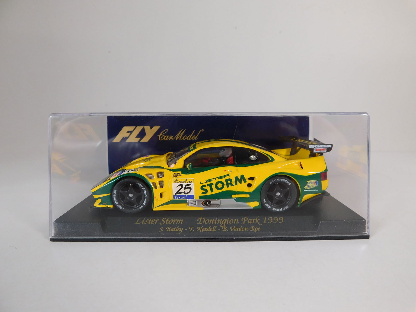Fly Car Model Lister Storm Donington Park 1999 #25: Fly Car Model Lister Storm Donington Park 1999 Bailey - Needell - Verdon Roe #25 Michelin 1/32 Slot Car. Reference #A104, with original case. Weight: 6.7 oz.