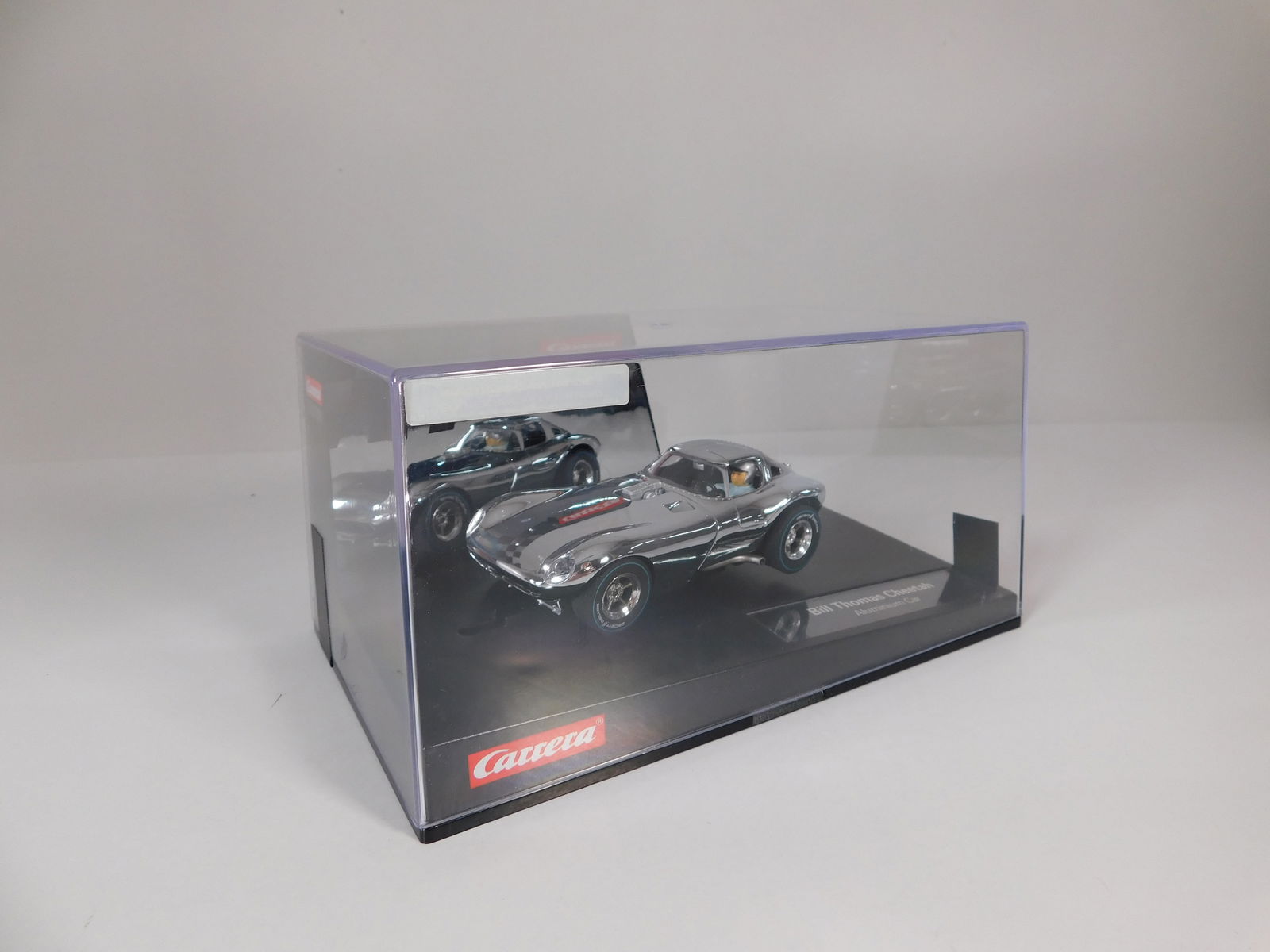 Carrera Evolution Bill Thomas Cheetah Aluminium: Carrera Evolution Bill Thomas Cheetah Aluminium 1/32 Slot Car. Reference #27432, with original case. Weight: 15.7 oz.