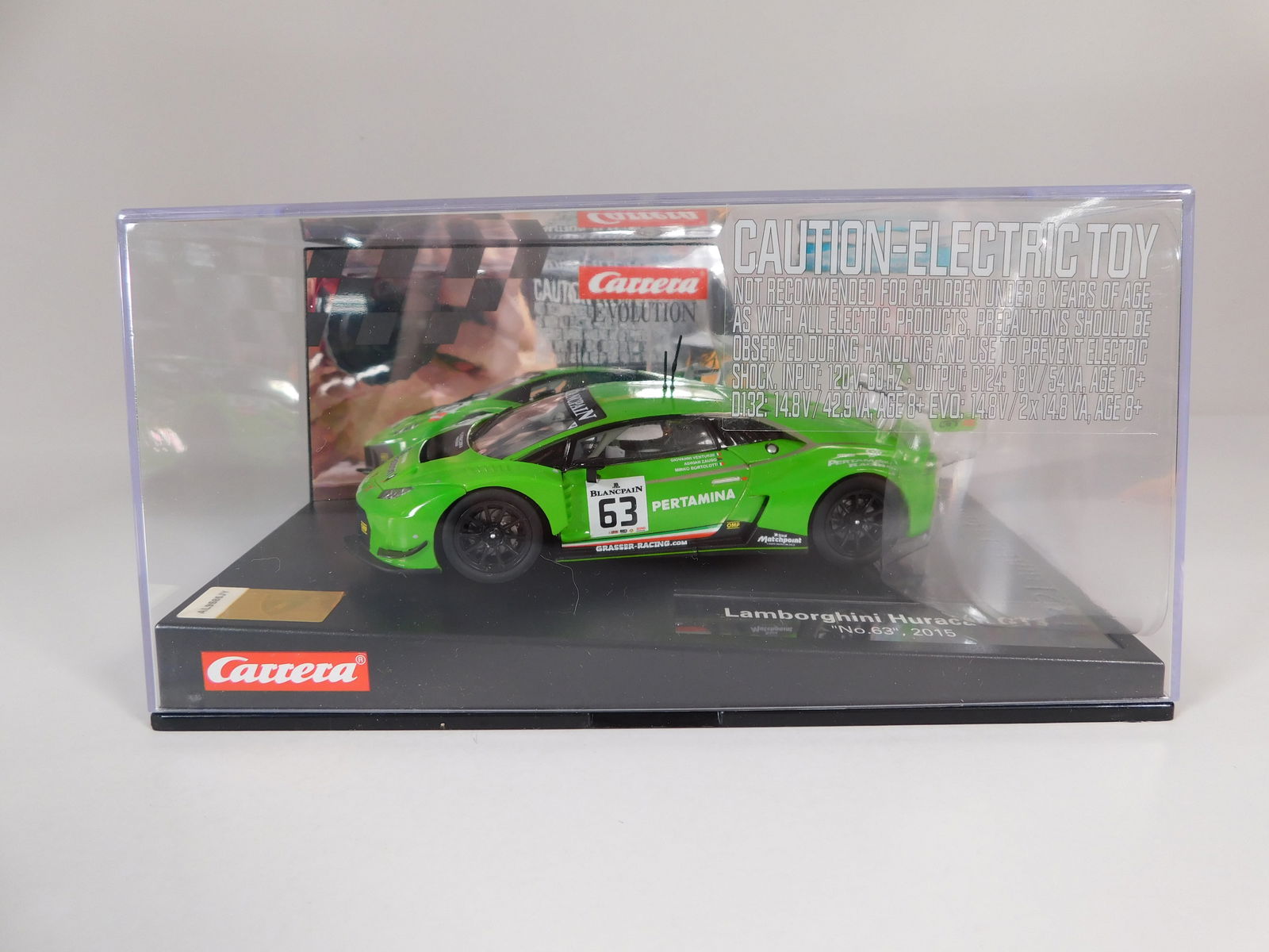 Carrera Evolution Lamborghini Huracan GT3 2015 #63: Carrera Evolution Lamborghini Huracan GT3 2015 #63 BlancPain 1/32 Slot Car. Reference #20027530, with original case. Weight: 1lb.