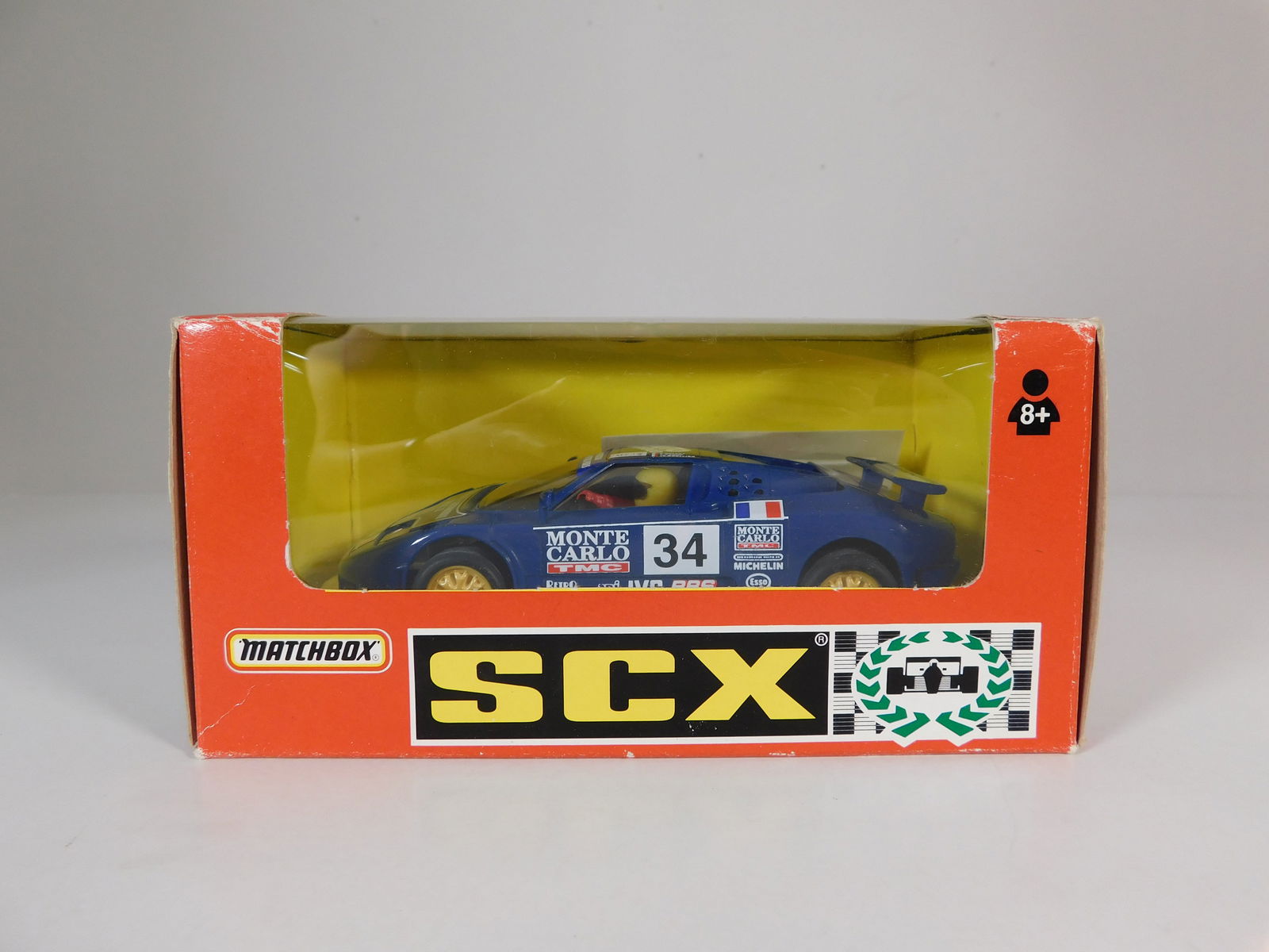 Matchbox SCX Bugatti Le Mans #34: Matchbox SCX Bugatti Le Mans #34 Monte Carlo 1/32 Slot Car. Reference #83860.20, with original case. Weight: 5.8 oz. 