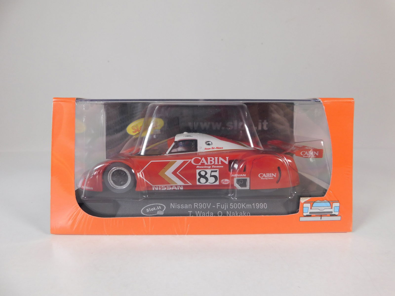 Slot.it Nissan R90V Fuji 500km 1990 #85: Slot.it Nissan R90V AJSPC Suzuka Fuji 500km 1990 T. Wada. O. Nakako #85 Cabin 1/32 Slot Car. Reference #CA28c. Weight: 7.1 oz. Shrink-wrapped. New.
