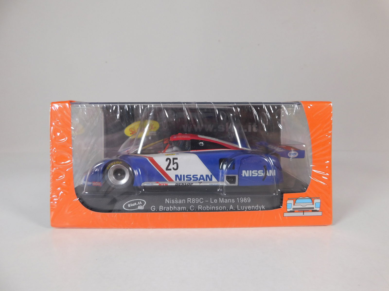 Slot.it Nissan R89C Le Mans 1989 #25: Slot.it Nissan R89C Le Mans 1989 Brabham-Robinson-Luyendyk #25 1/32 Slot Car. Reference #CA28d, with original case. Weight: 7oz. Shrink-wrapped - new in box.