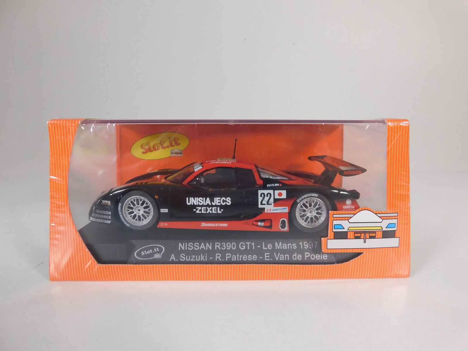 Slot.it Nissan R390 GT1 Le Mans 1997 #22: Slot.it Nissan R390 GT1 Le Mans 1997 Suzuki - Patrese - Poele #22 Unisia Jecs 1/32 Slot Car. Reference #SICA05D, with original case. Weight: 7.4 oz. Shrink-wrapped - new in box.