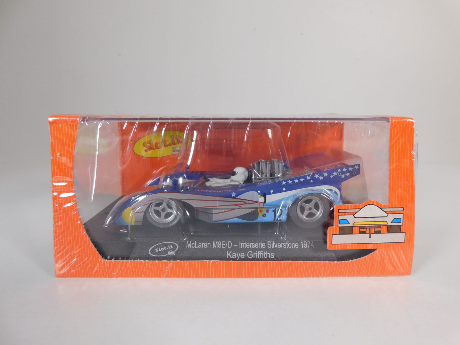 Slot.it McLaren M8E/D Interserie Silverstone 1974 #12: Slot.it McLaren M8E/D Interserie Silverstone 1974 Kaye Griffiths #12 1/32 Slot Car. Reference #CA26b, with original case. Weight: 6.7 oz.