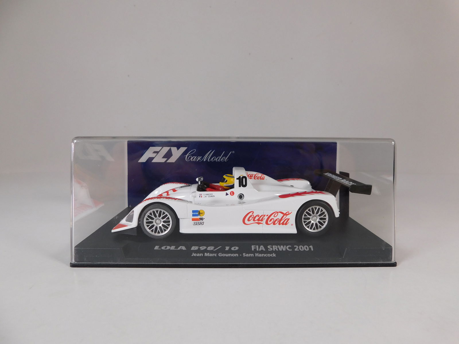 Fly Car Model Lola B98/10 FIA SRWC 2001 #10: Fly Car Model Lola B98/10 FIA SRWC 2001 A504 Gounon - Hancock #10 Coca Cola 1/32 Slot Car. Reference #88050, with original case. Weight: 6.2 oz.