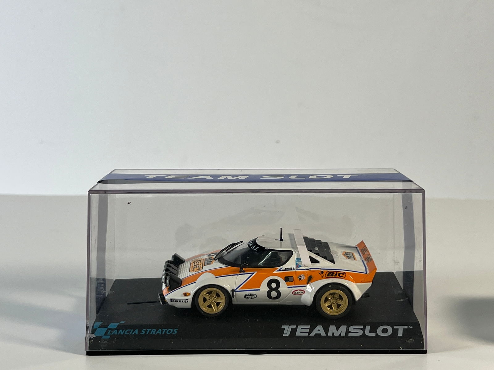 Team Slot Lancia Stratos #8: Team Slot Lancia Stratos #8 Bic 1/32 Slot Car. Reference #PDV01011510, with original case. Weight: 7 oz.