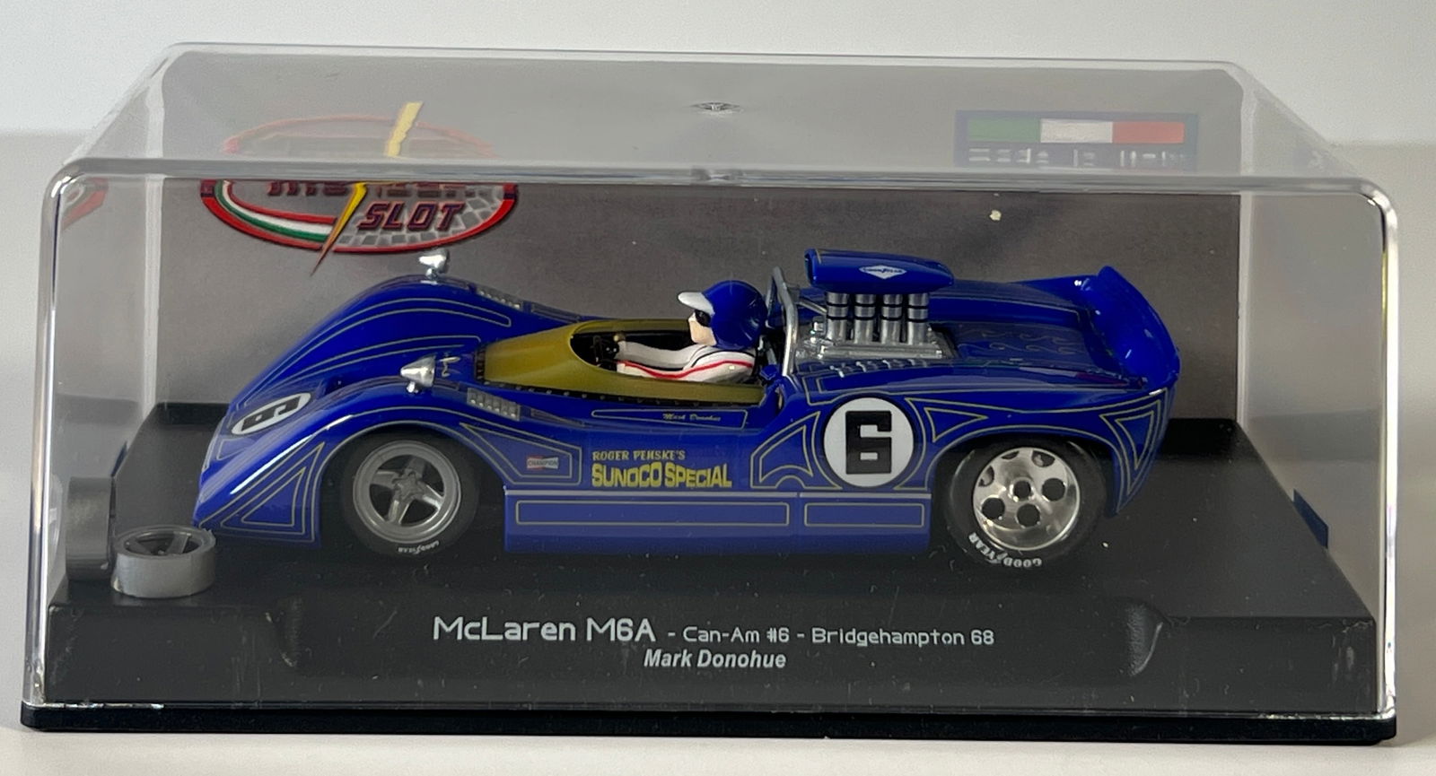 Thunder Slot McLaren M6A Can-Am Bridgehampton 68 #6: Thunder Slot McLaren M6A Can-Am Bridgehampton 68 Mark Donohue #6 Sunoco 1/32 Slot Car. Reference #CA00303S/W, with original case. Weight: 6 oz.