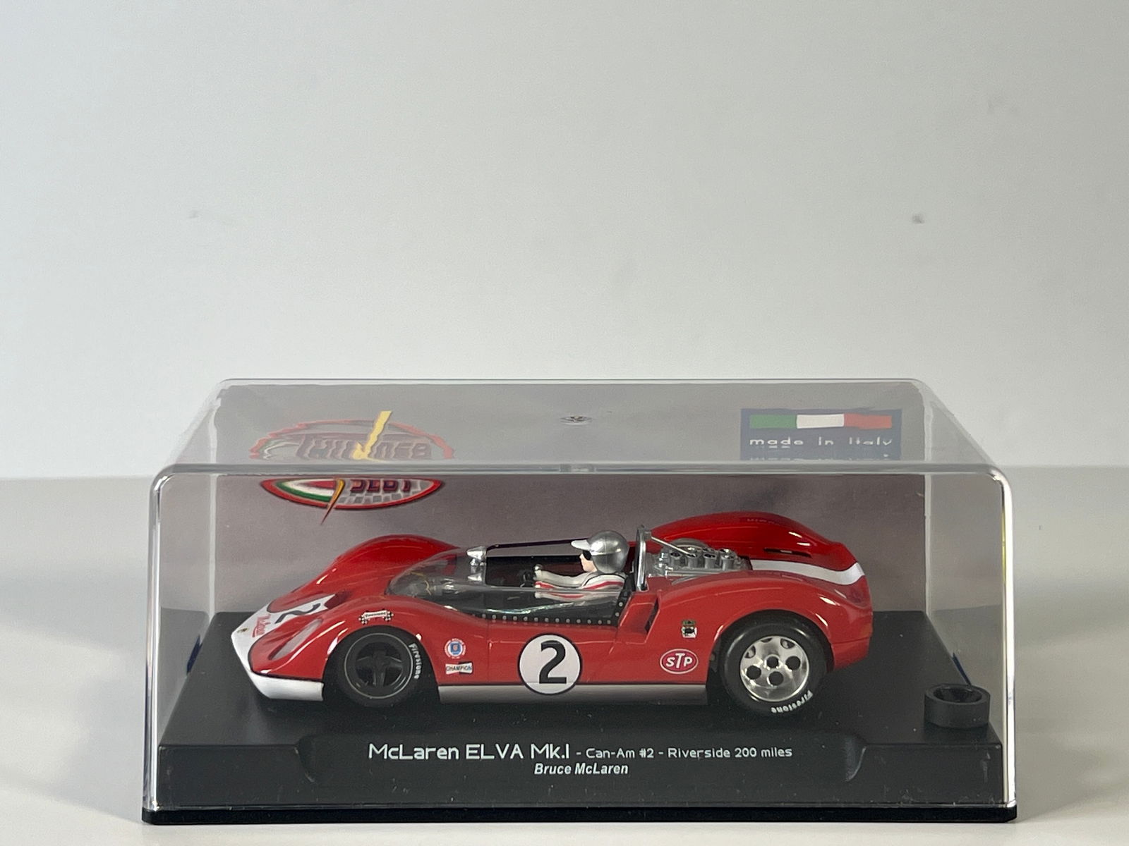 Thunder Slot McLaren ELVA MK.I Can-Am Riverside 200 Miles #2: Thunder Slot McLaren ELVA MK I Can-Am Riverside 200 Miles Bruce McLaren #2 1/32 Slot Car. Reference #CA00402S/W, with original case. Weight: 6 oz.