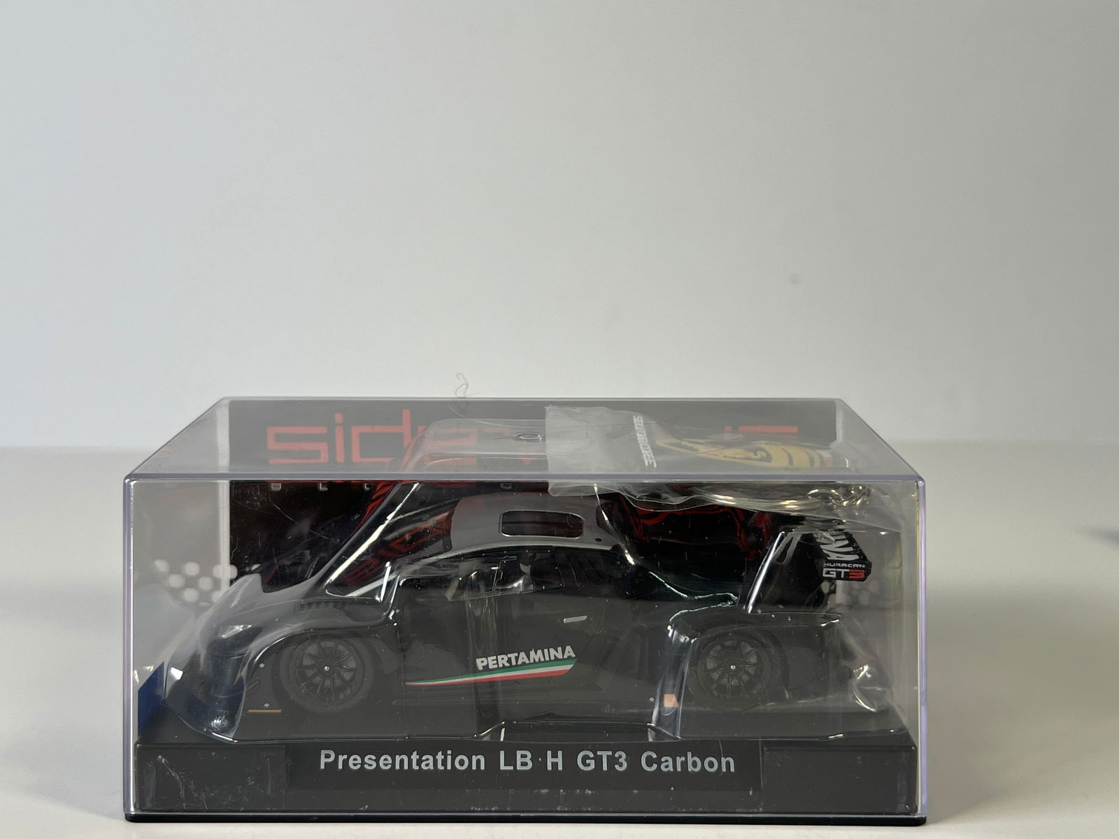 Sideways Presentation Lamborghini H GT3 Carbon Squadra Corse: Sideways Presentation Lamborghini H GT3 Carbon Squadra Corse - Pertamina 1/32 Slot Car. Reference #SWCAR01B, with original case. Weight: 8 oz. Case length: 6.5 inches.