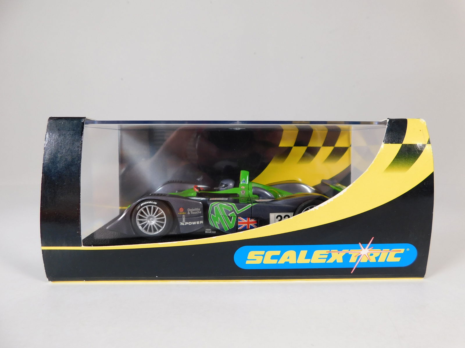 Scalextric MG Lola Le Mans 2001 #33: Scalextric MG Lola Le Mans 2001 #33 XPower 1/32 Slot Car. Reference #C2366, with original case. Weight: 7.4 oz.