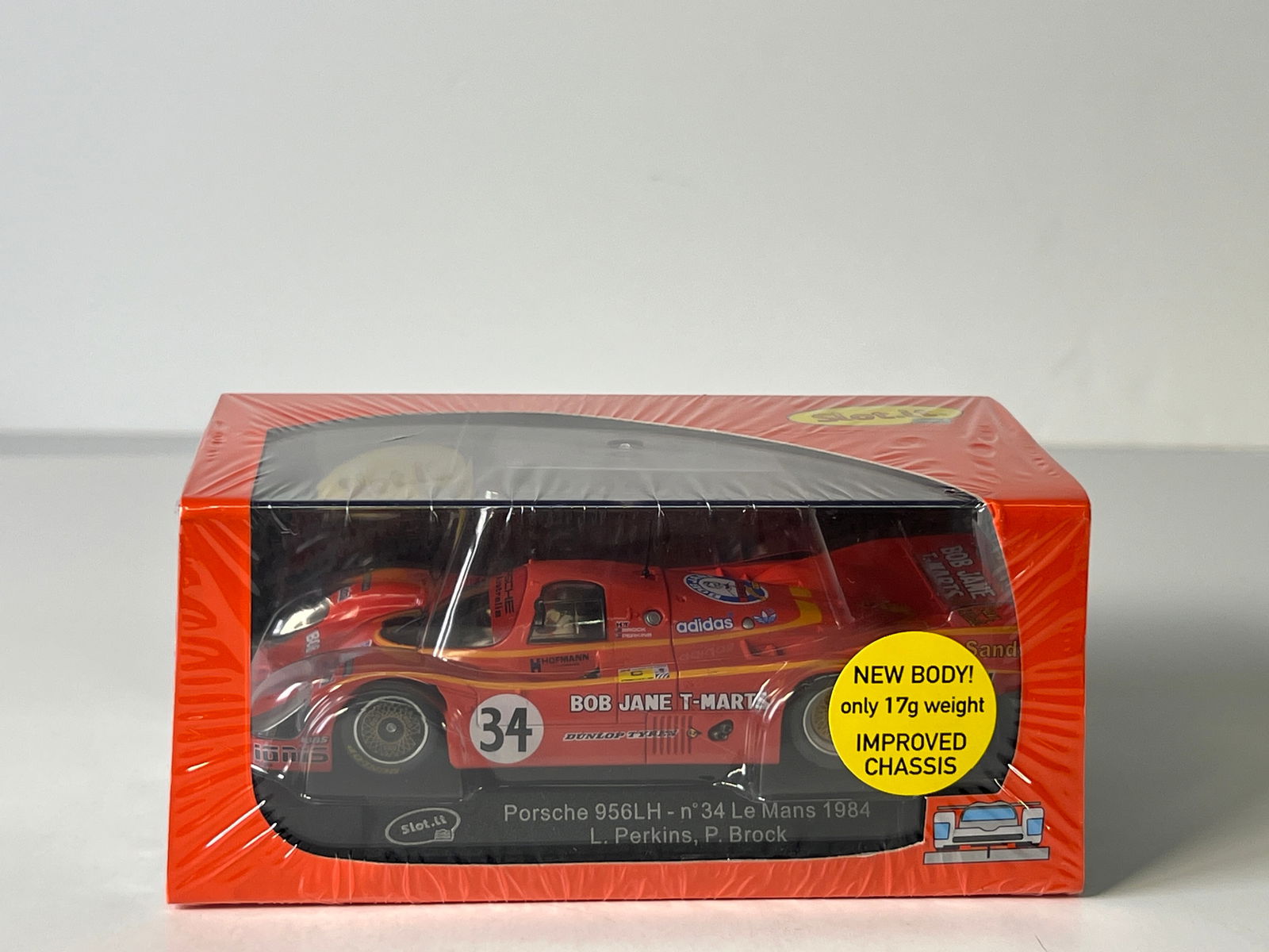 Slot.it Porsche 956LH LeMans 1984 #34: Slot.it Porsche 956LH #34 Le Mans 1984 Perkins - Brock Bob Jane T-Marts 1/32 Slot Car. Reference #CA02g, with original case. Weight: 7 oz. Shrink-wrapped - new in box.