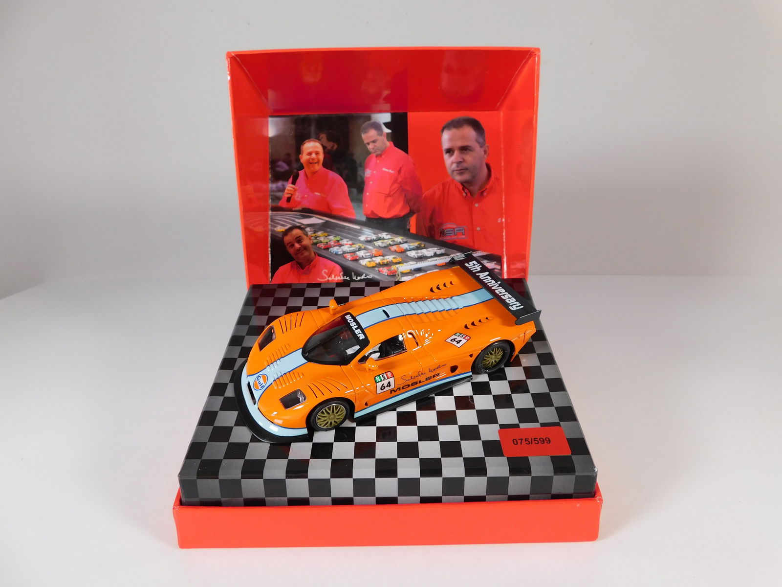 NSR Mosler MT900R Salvatore Noviello 5th Anniversary Limited Edition #64: NSR Mosler MT900R Salvatore Noviello 5th Anniversary Limited Edition #64 Gulf 1/32 Slot Car. Reference #SET08, with original case. Weight: 12.2 oz.
