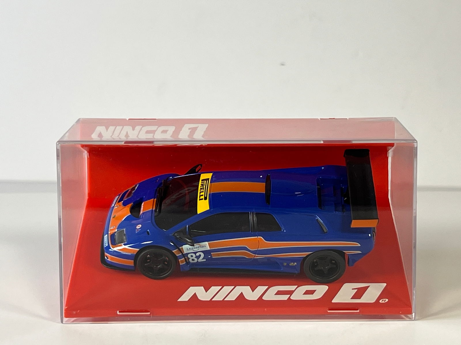 Ninco One Lamborghini Diablo GTR #82: Ninco One 55048 Lamborghini Diablo GTR Nogaro #82 Pirelli 1/32 Slot Car, with original case. Weight: 7 oz.