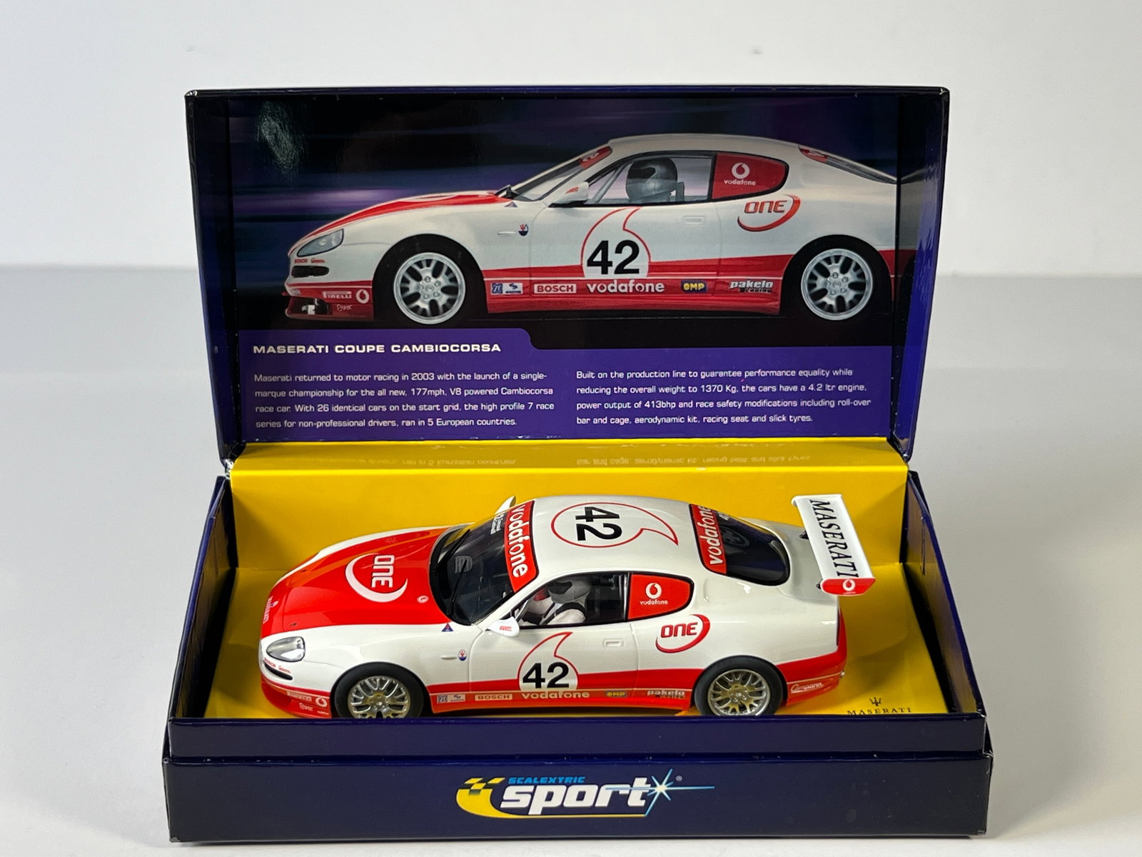 Maserati Coupe Cambiocorsa #42 Limited Edition: Maserati Coupe Cambiocorsa #42 Vodafone 1/32 Slot Car. Reference #C2504AT, with original case. Case length: 7.25 inches. Weight: 9 oz. Limited edition of 5000