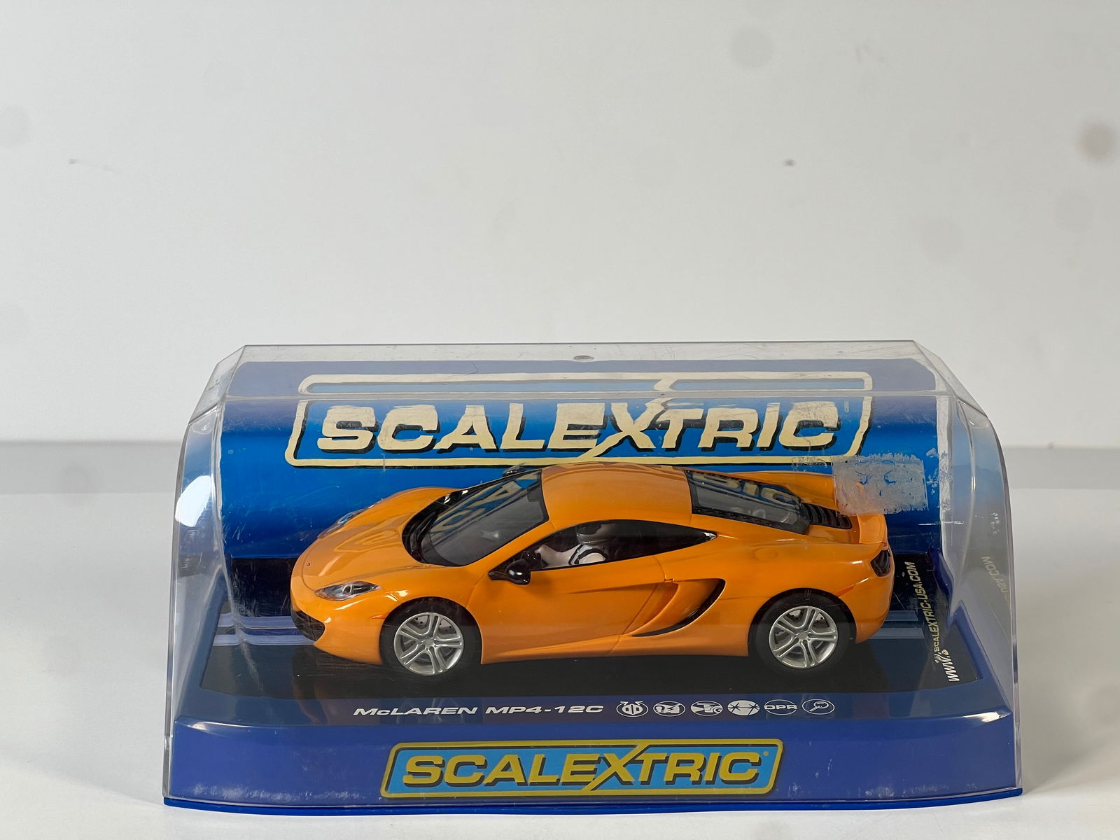 Scalextric McLaren MP4-12C: Scalextric McLaren MP4-12C 1/32 Slot Car. Reference #C3200, with original case. Weight: 9 oz.