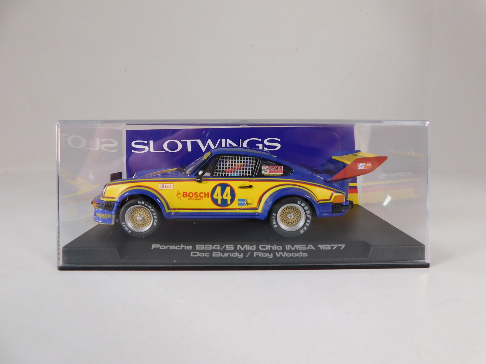 Slotwings Porsche 934/5 Mid Ohio IMSA 1977 #44: Slotwings Porsche 934/5 Mid Ohio IMSA 1977 Bundy / Woods #44 Bosch 1/32 Slot Car. Reference #W065-03, with original case. Weight: 6.4 oz.