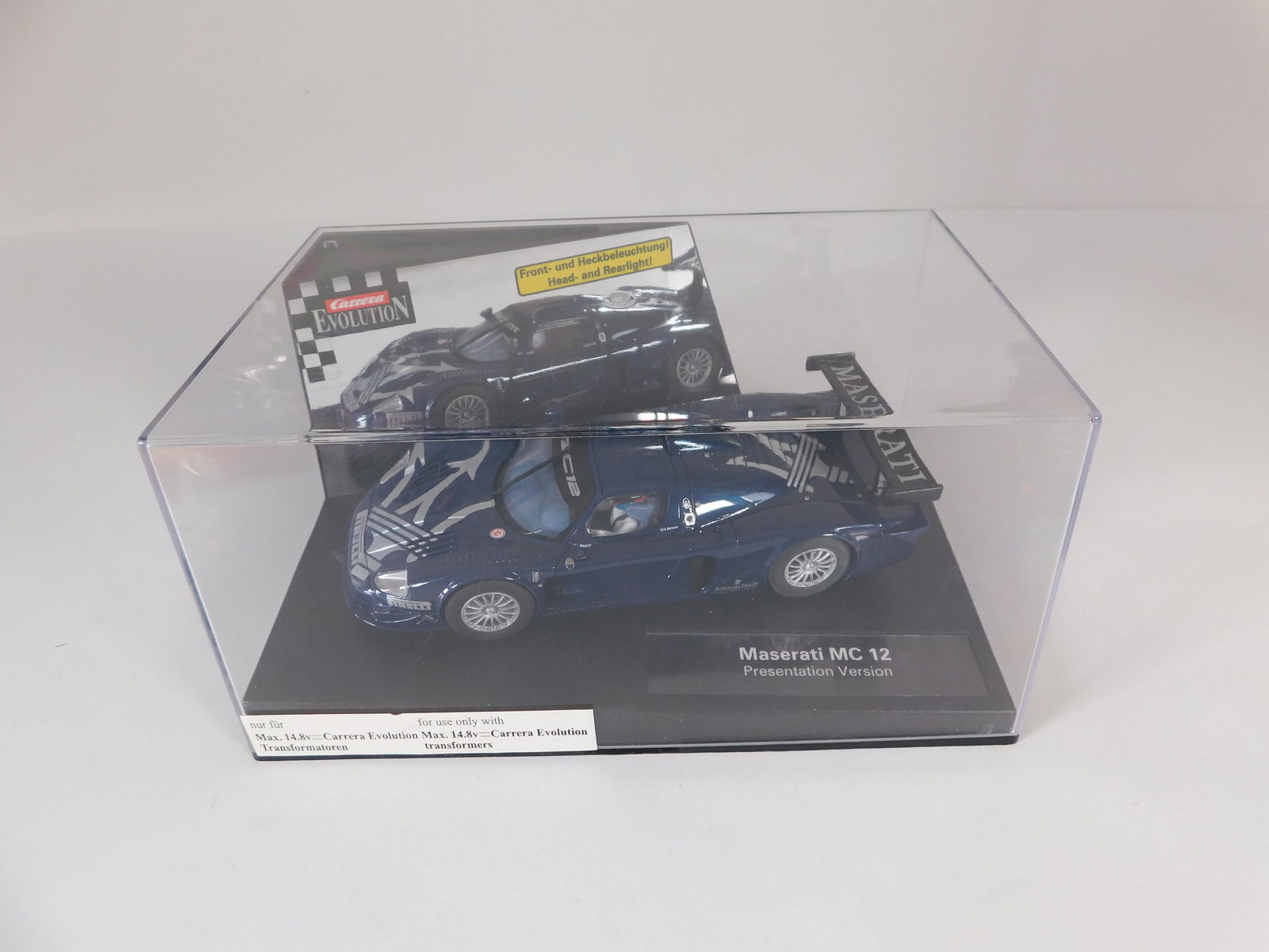 Evolution Maserati MC 12 Presentation Version: Evolution Maserati MC 12 Presentation Version Pirelli 1//32 Slot Car. Reference #25749, with original case. 