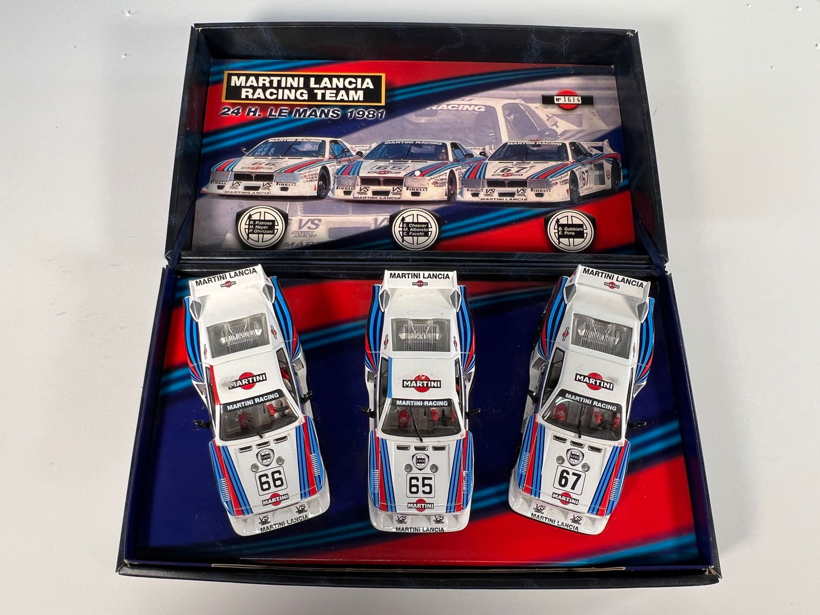 Fly Martini Lancia Racing Team 24 H. Le Mans 1981 Slot Car Set: Fly Martini Lancia Racing Team 24 H. Le Mans 1981 1/32 slot car set. Includes three slot cars numbered 65, 66, and 67. Comes in original presentation box. Limited edition #1614