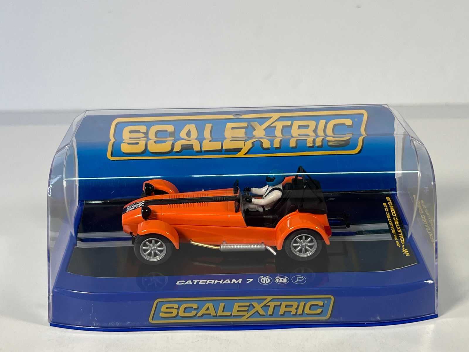 Scalextric Caterham 7 Slot Car - Limited Edition: Scalextric Caterham 7 slot car, orange with black stripe, in original display case. Limited Edition No. 9 of 150. C3436, SLN 2013.