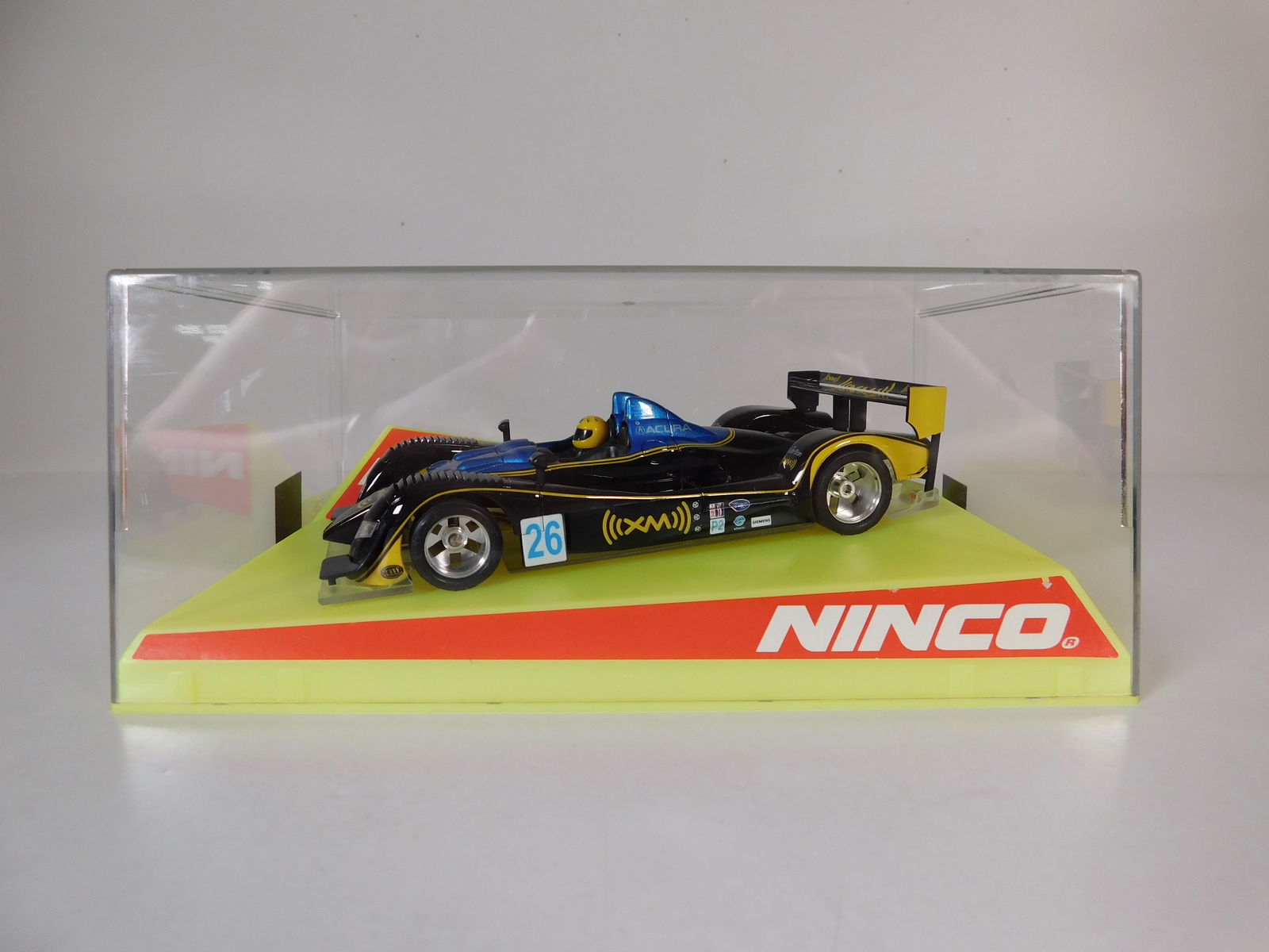 Ninco Acura Lightning #26: Ninco Acura Lightning XM #26 1/32 Slot Car. Reference #50525, with original case. Weight: 9 oz.