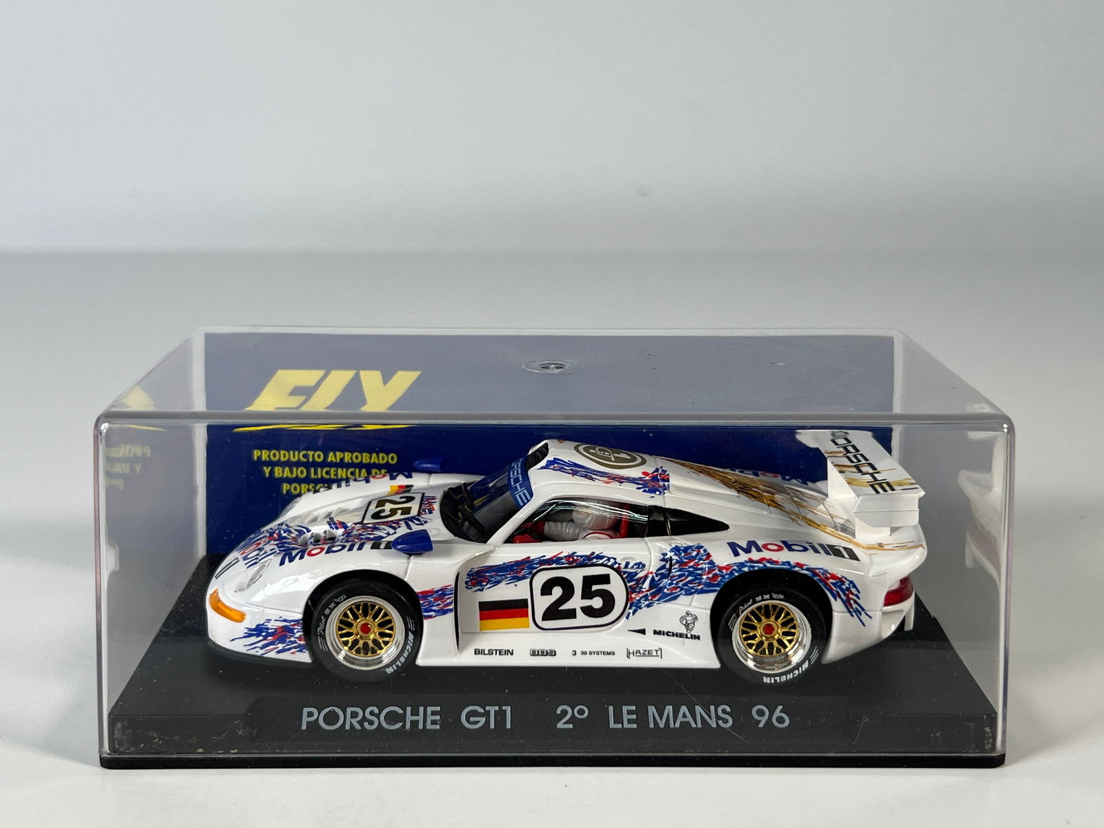 Fly Porsche GT1 Blanco Le Mans 96 #25: Fly Porsche GT1 Blanco 2° Le Mans 96 #25 Mobil1 1/32 Slot Car. Reference #A31, with original case. Case measures 6.5 inches in length. Weight: 6.7 oz.