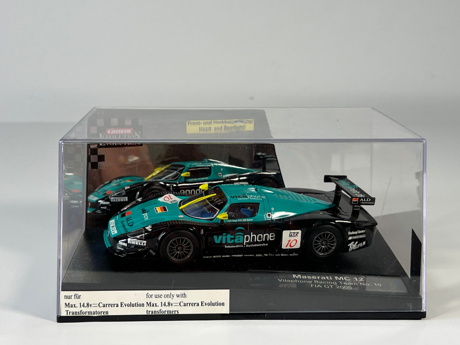 Carrera Evolution Maserati MC12 FIA GT 2005 #10: Carrera Evolution Maserati MC12 Vitaphone Racing Team FIA GT 2005 #10 Pirelli 1/32 Slot Car, with original case. 