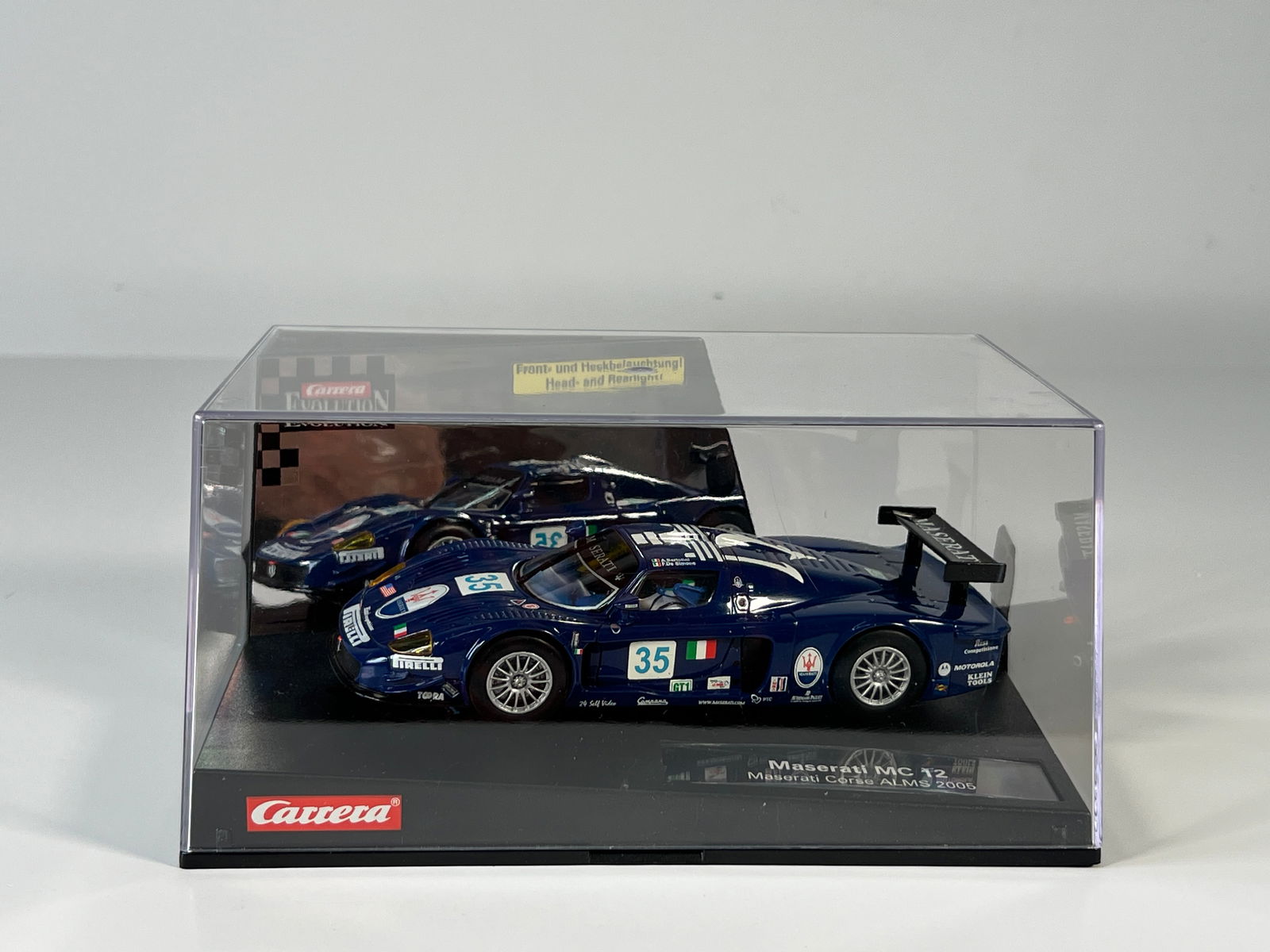 Carrera Evolution Maserati MC12 Corse ALMS 2005 #35: Carrera Evolution Maserati MC12 Corse ALMS 2005 #35 Pirelli 1/32 Slot Car, with original case. 