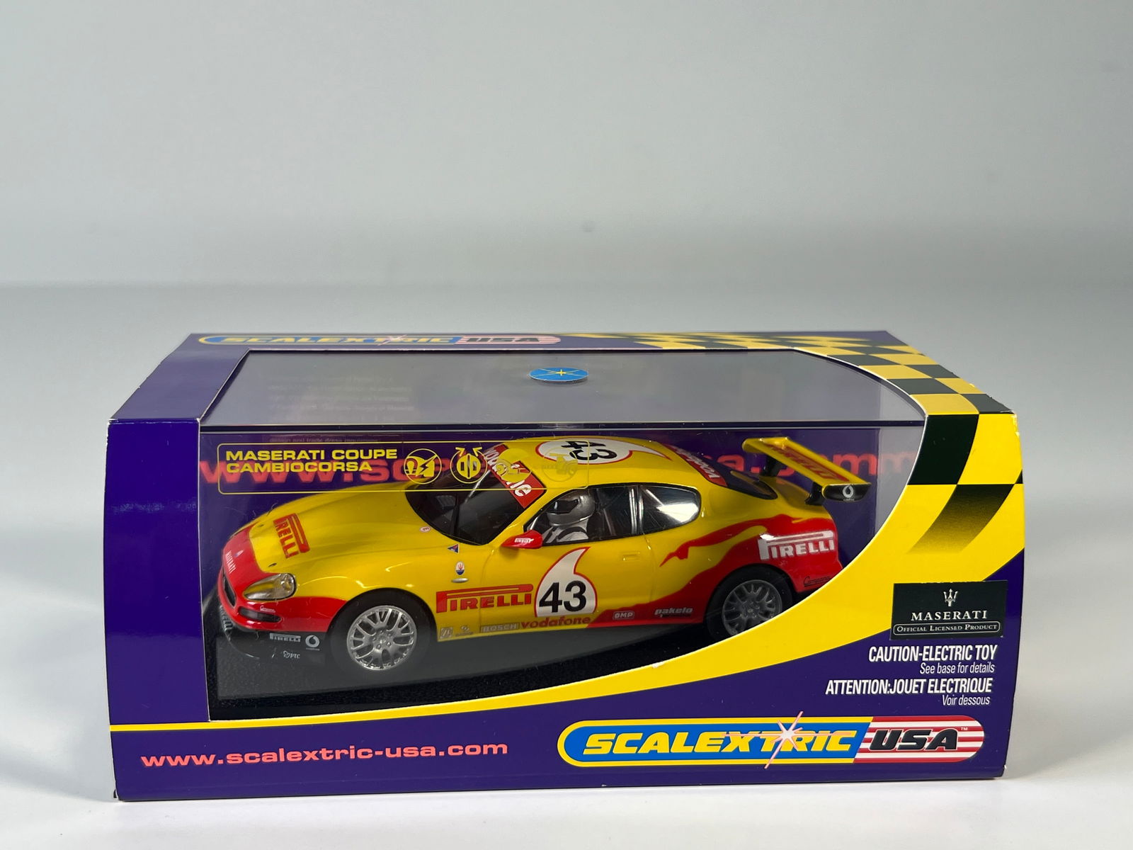 Scalextric USA Maserati Trofeo Coupe Cambiocorsa #43: Scalextric USA Maserati Trofeo Coupe Cambiocorsa #43 Pirelli 1/32 Slot Car, with original case. Weight: 7.6 oz.
