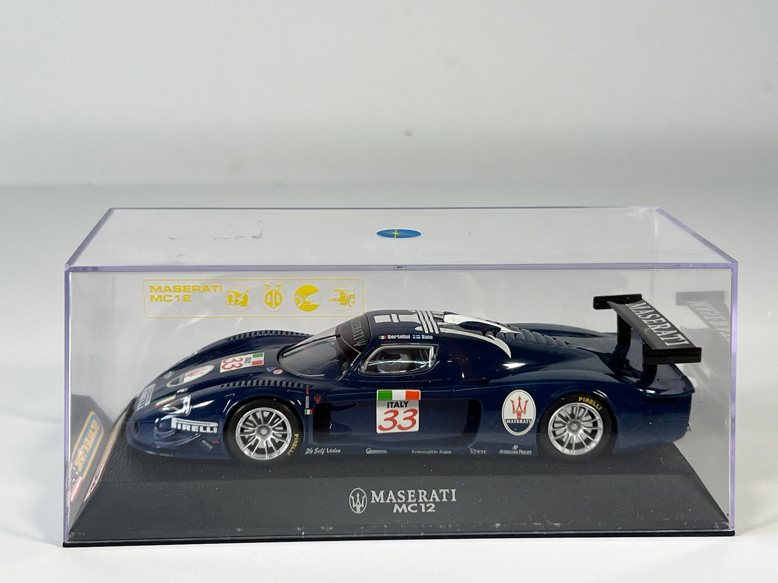 Scalextric USA Maserati MC12 #33: Scalextric USA Maserati MC12 #33 Pirelli 1/32 Slot Car, with original case. 
