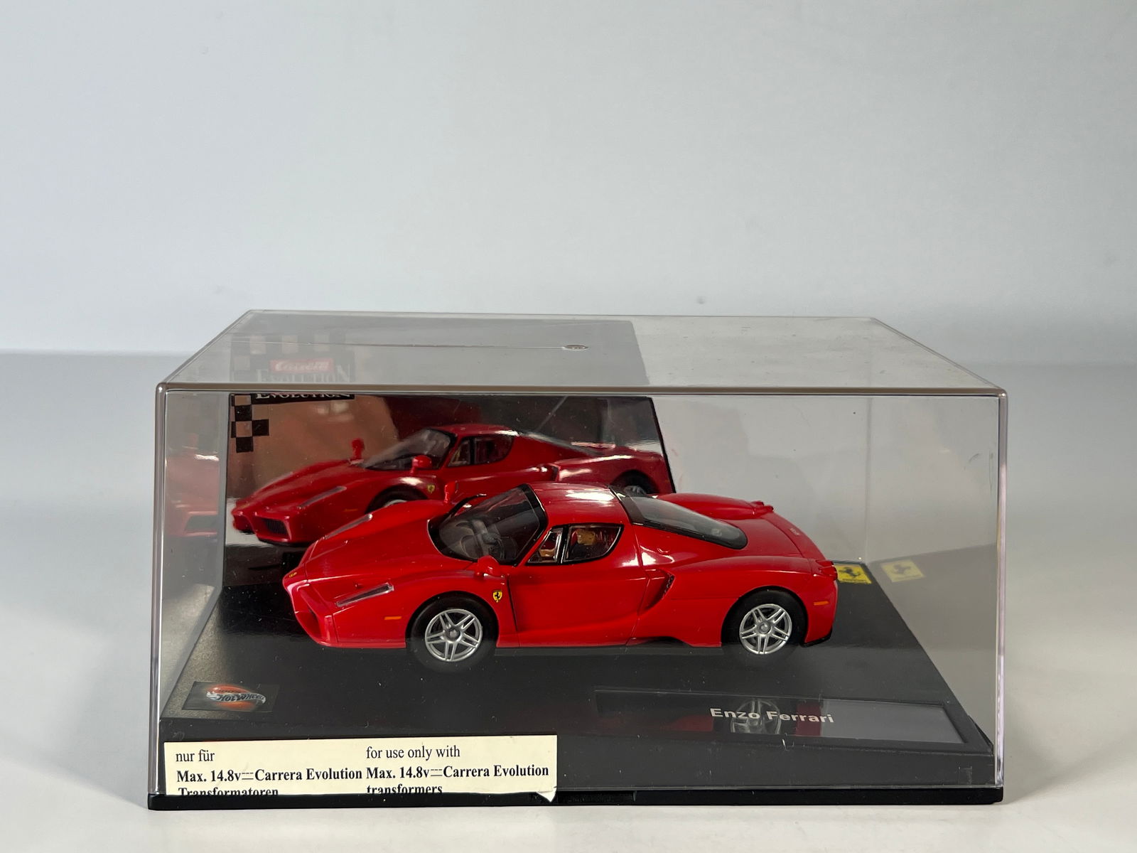 Carrera Evolution Enzo Ferrari: Carrera Evolution Enzo Ferrari 1/32 Slot Car, with original case. Weight: 14.6 oz. 